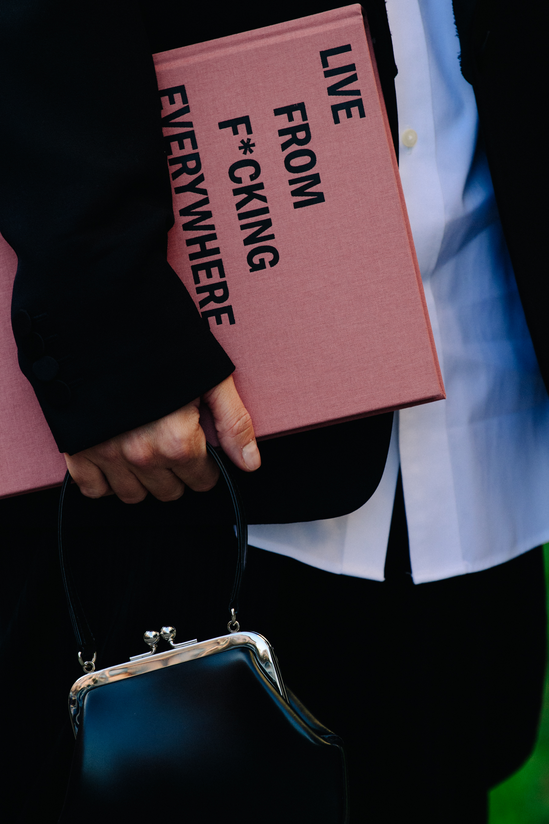 Woman carrying Adam Katz Sinding book
