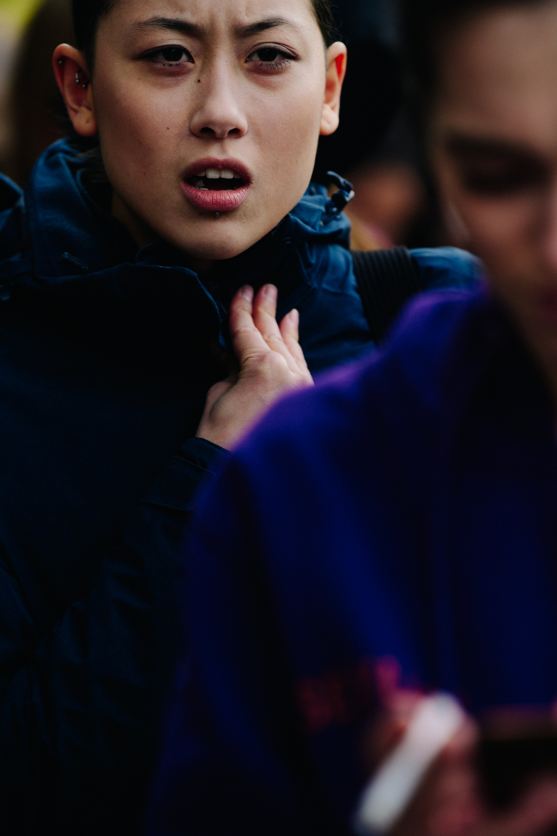Model wearing black coat