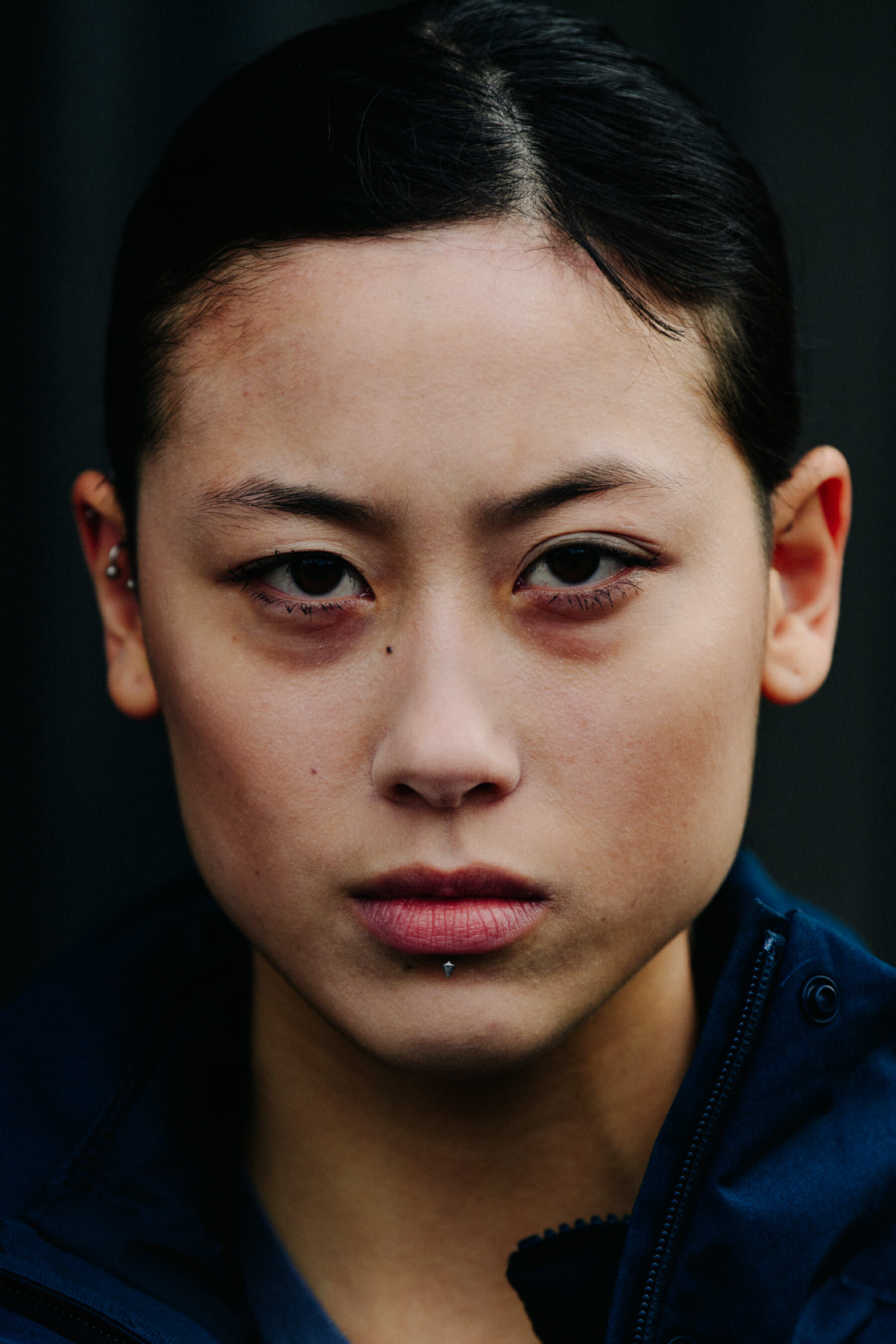 Model with lip piercing