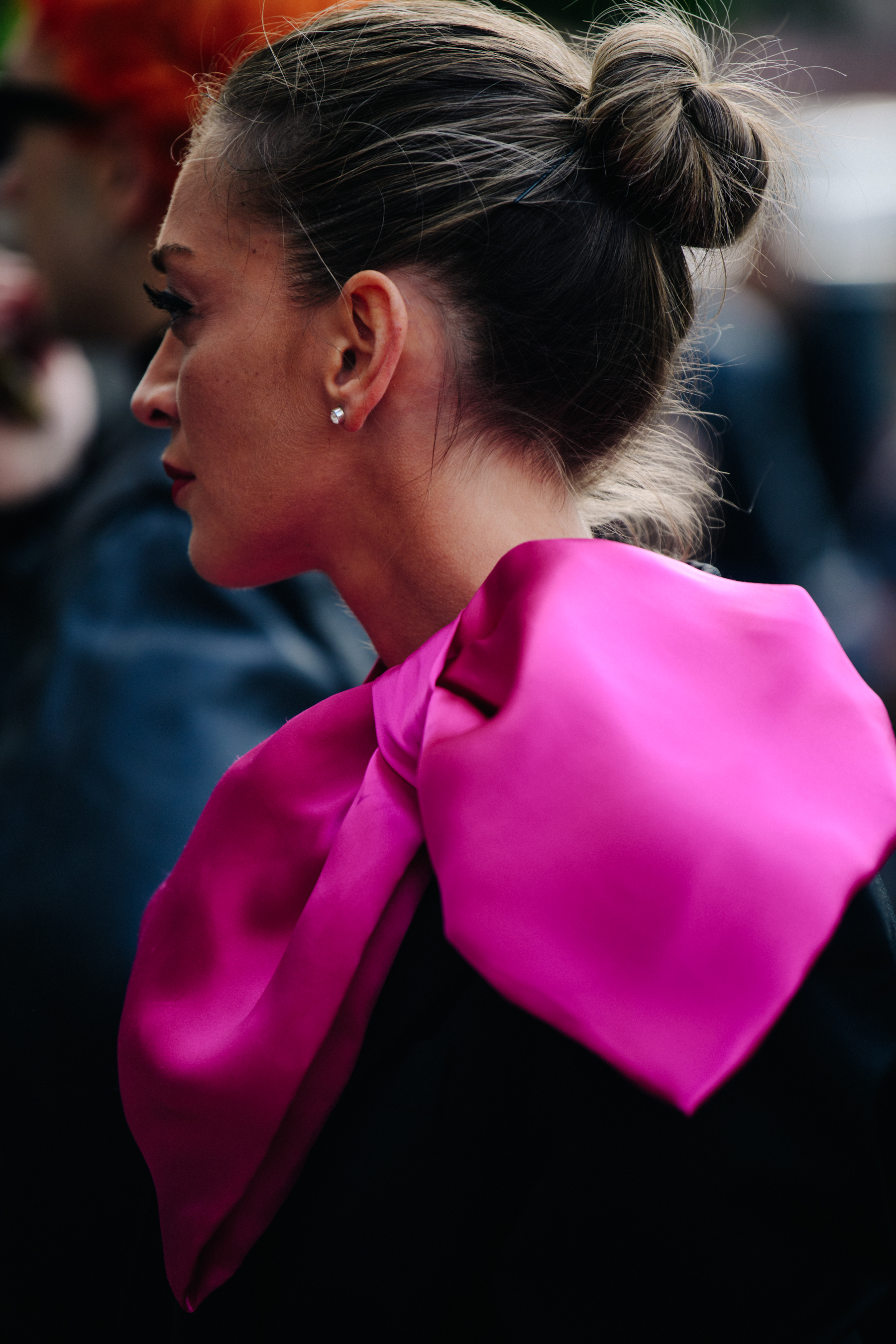 Woman wearing pink bowtie