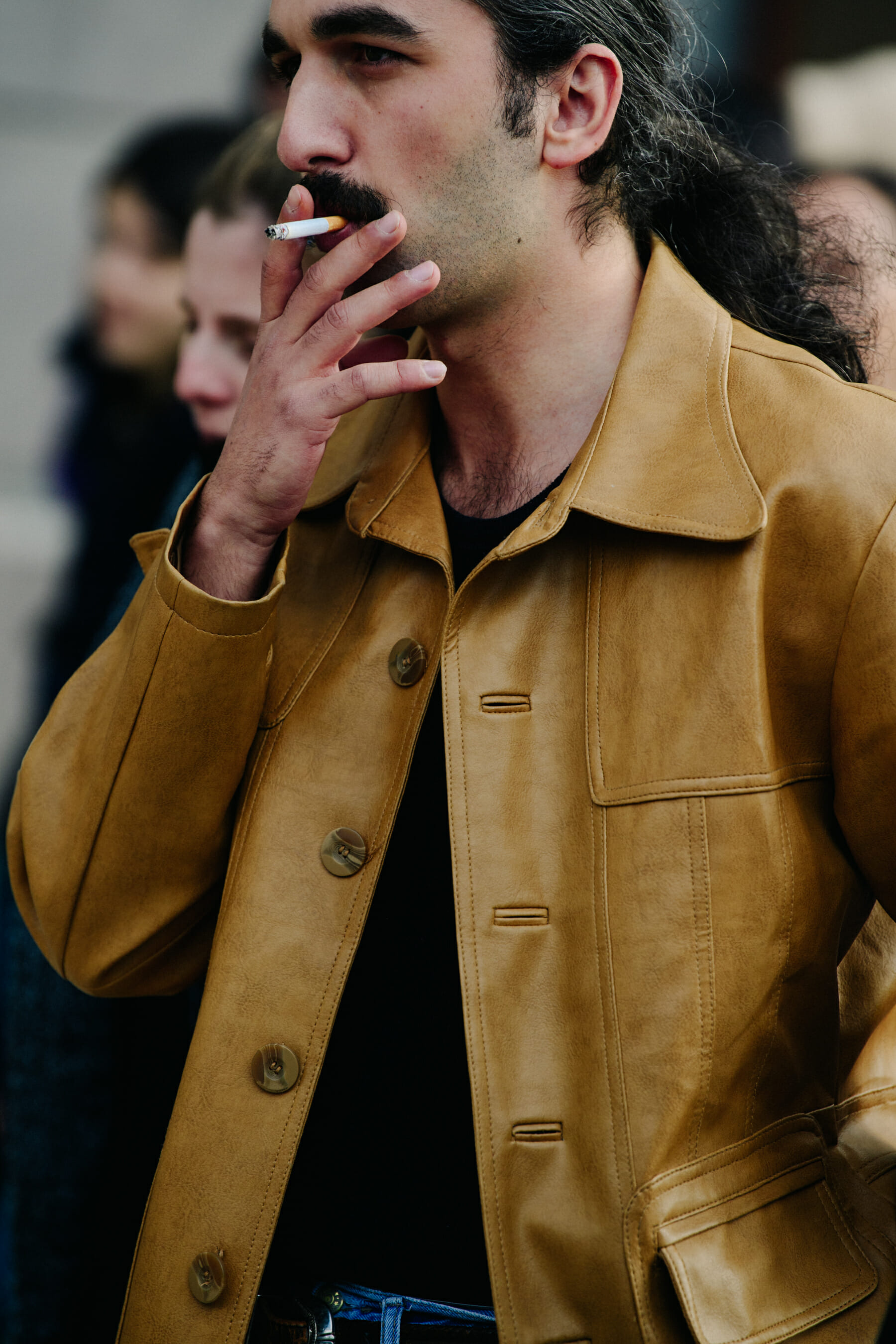 Man wearing yellow jacket