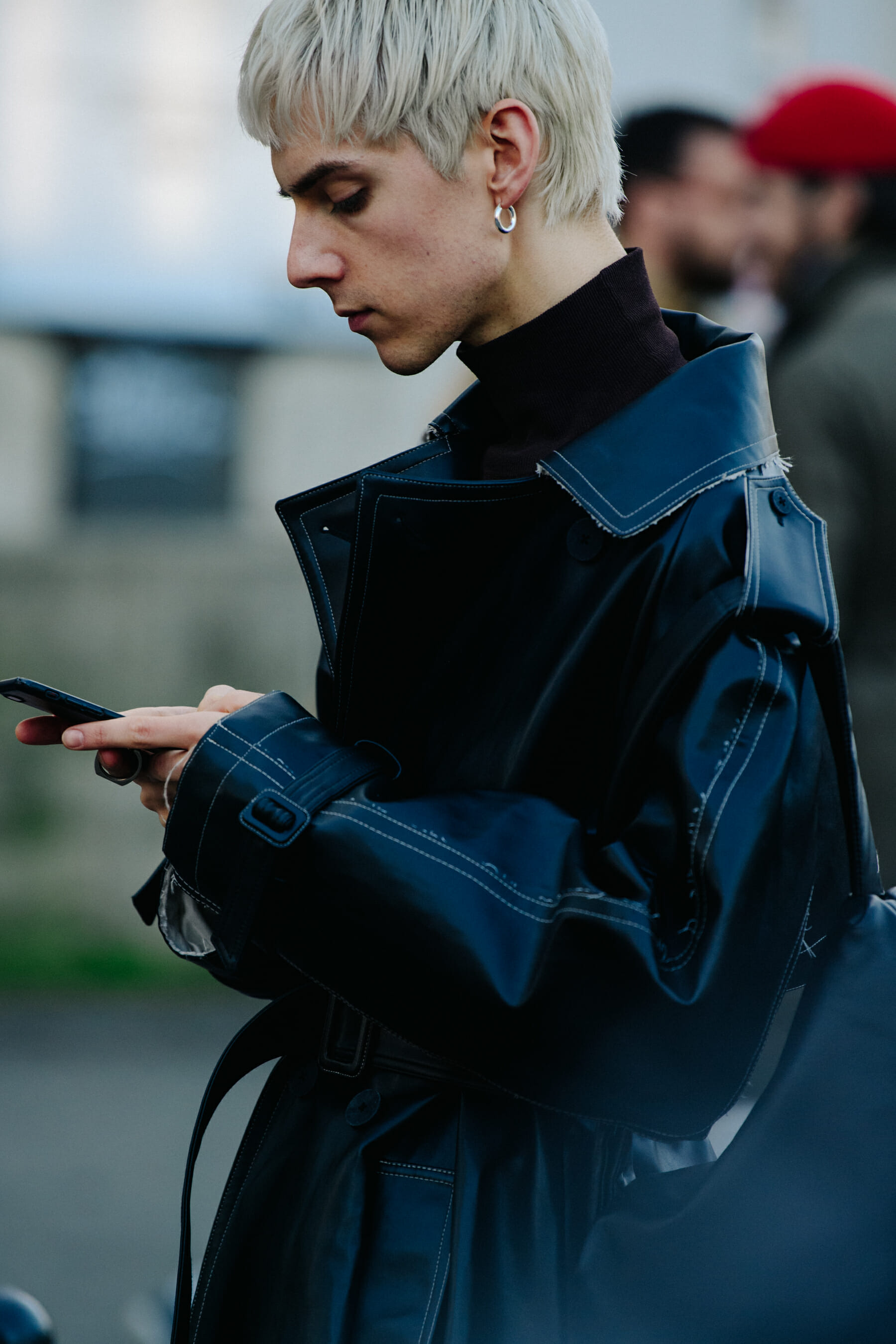 Man wearing plastic coat