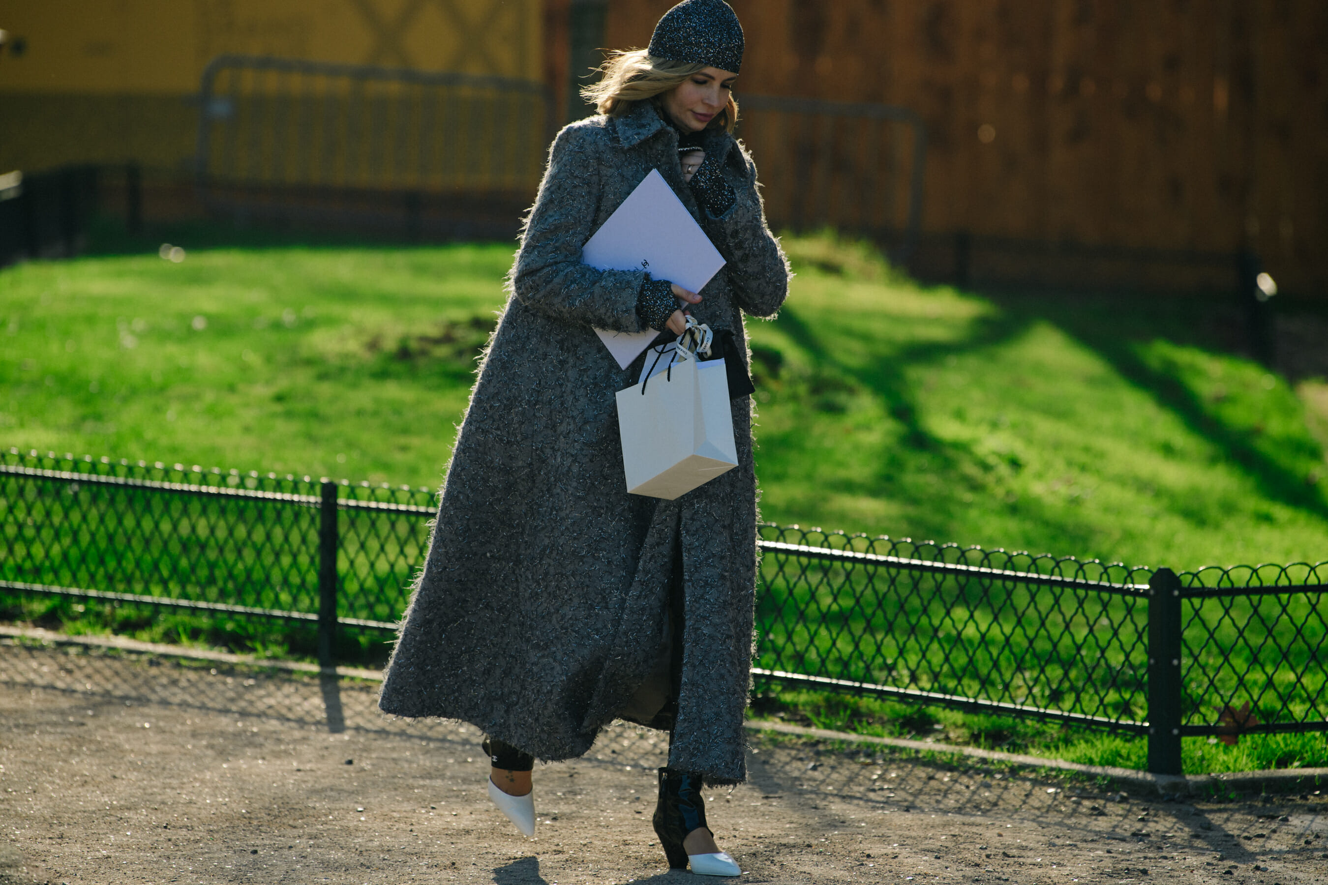 Woman wearing grey coat