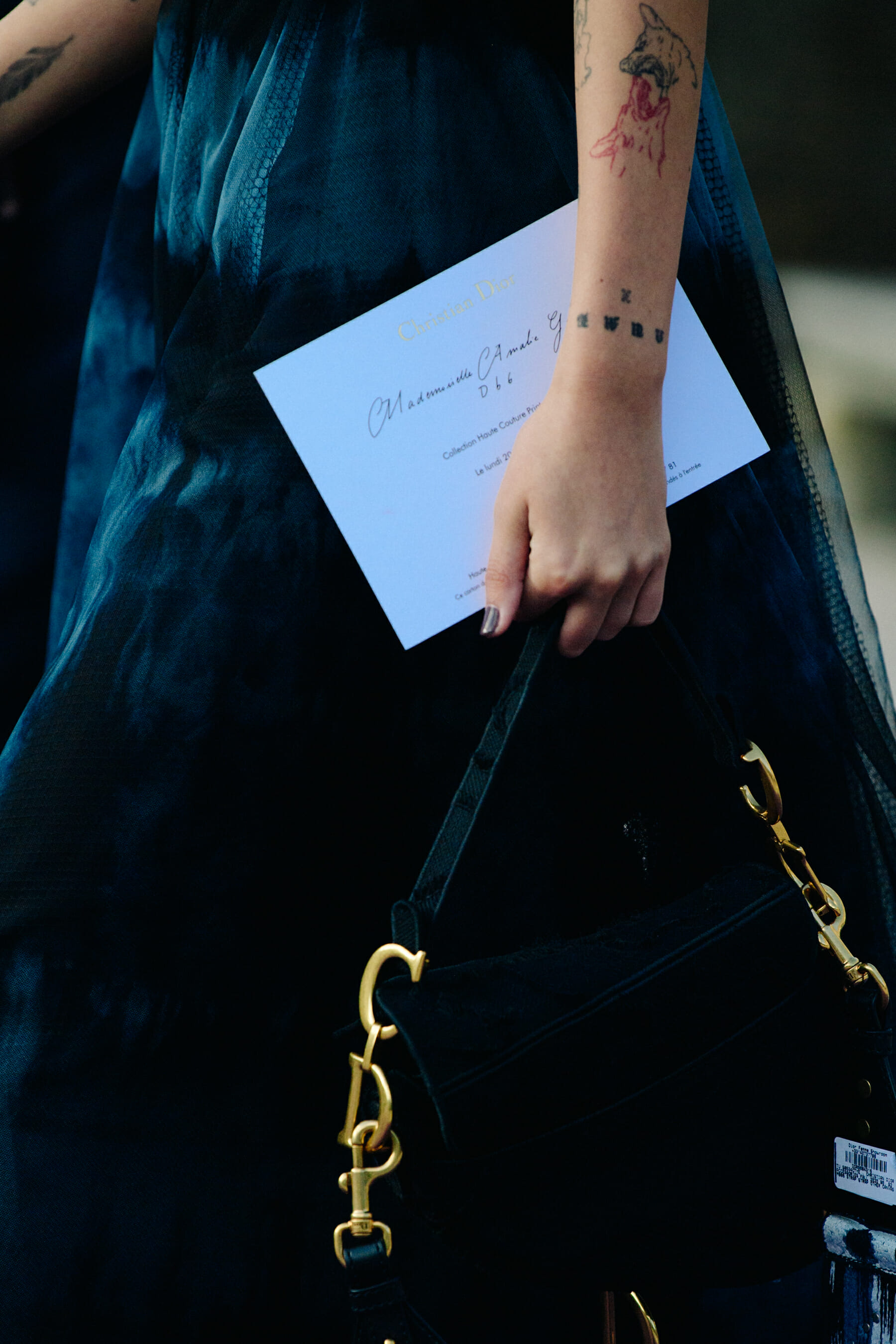 Woman carrying Dior bag