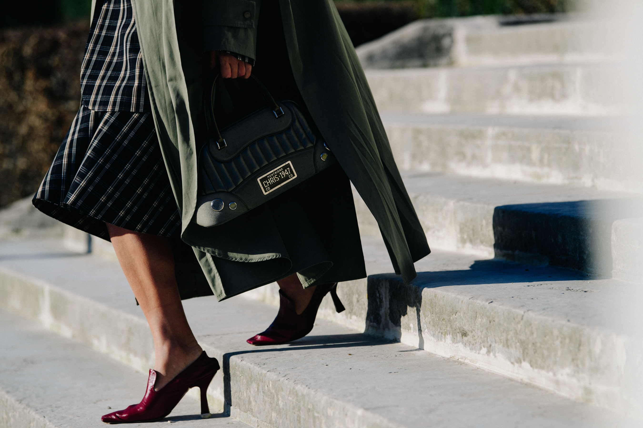 Woman carrying Dior bag