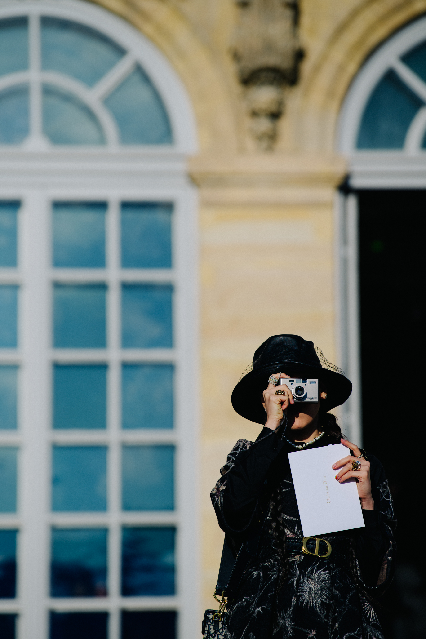 Woman using Contax T3 camera