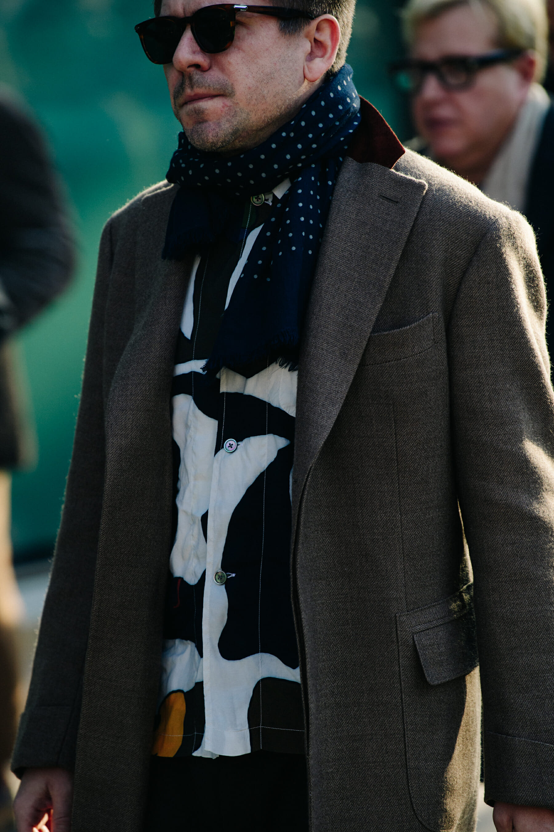 Man wearing brown coat