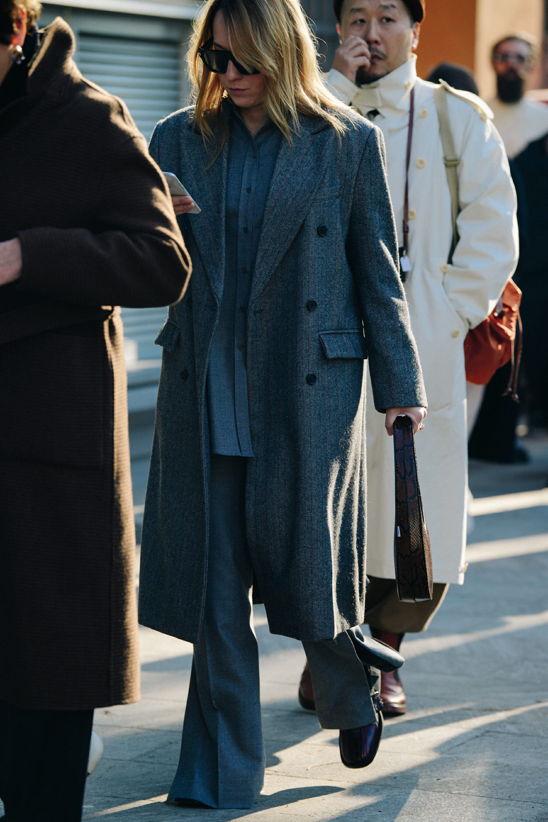 Woman wearing grey suit