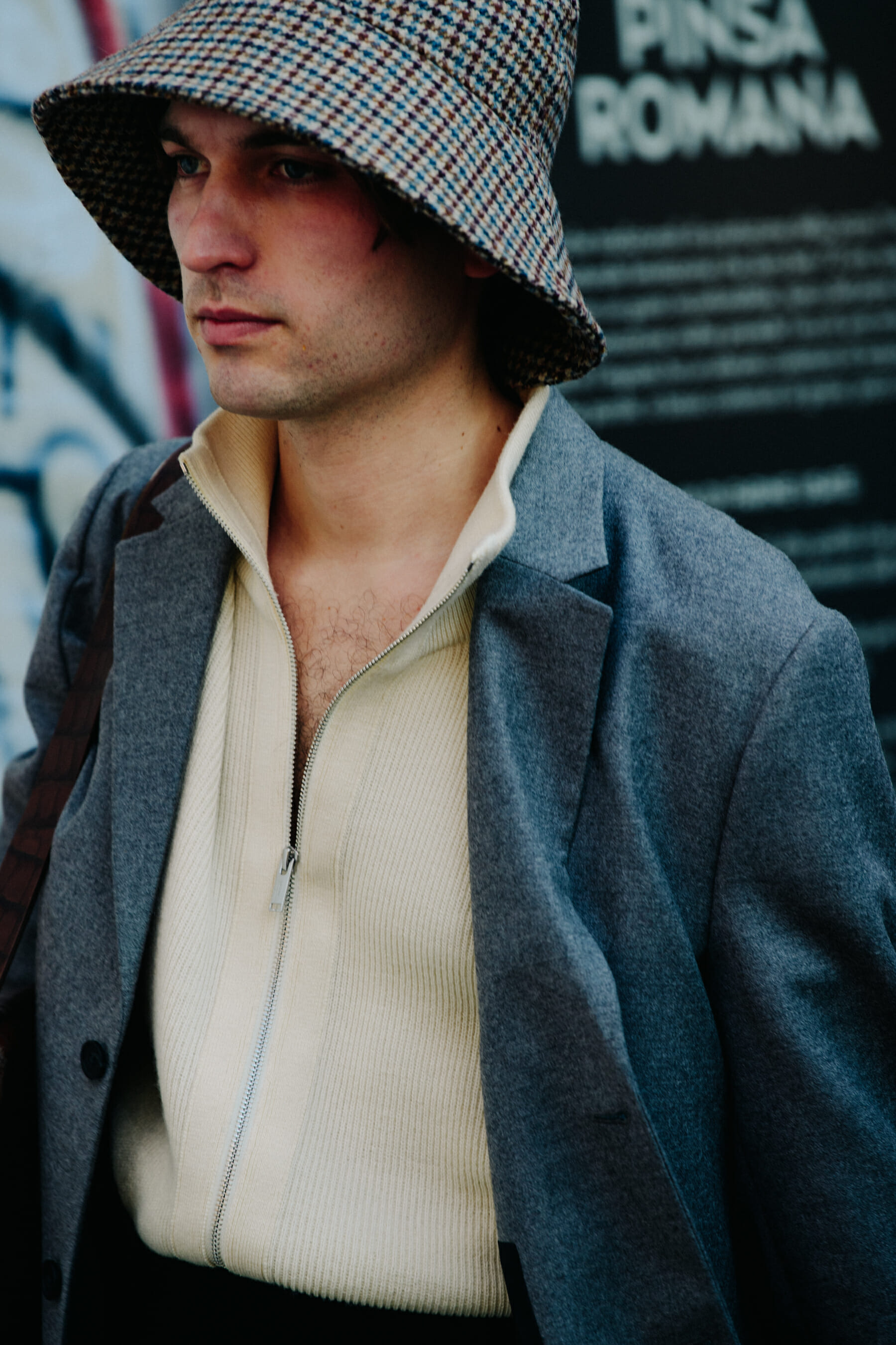Man wearing grey jacket