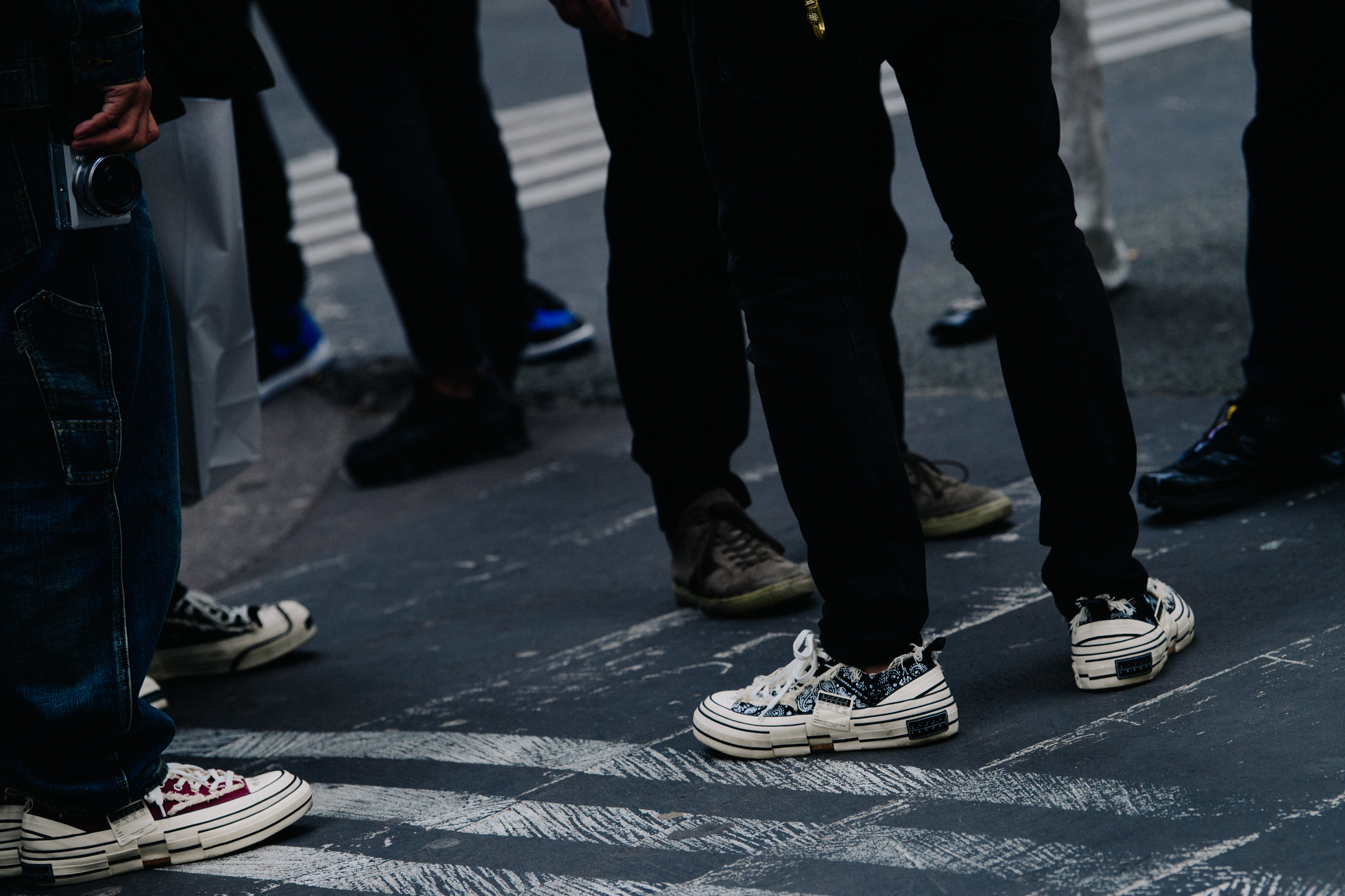 Men wearing Converse