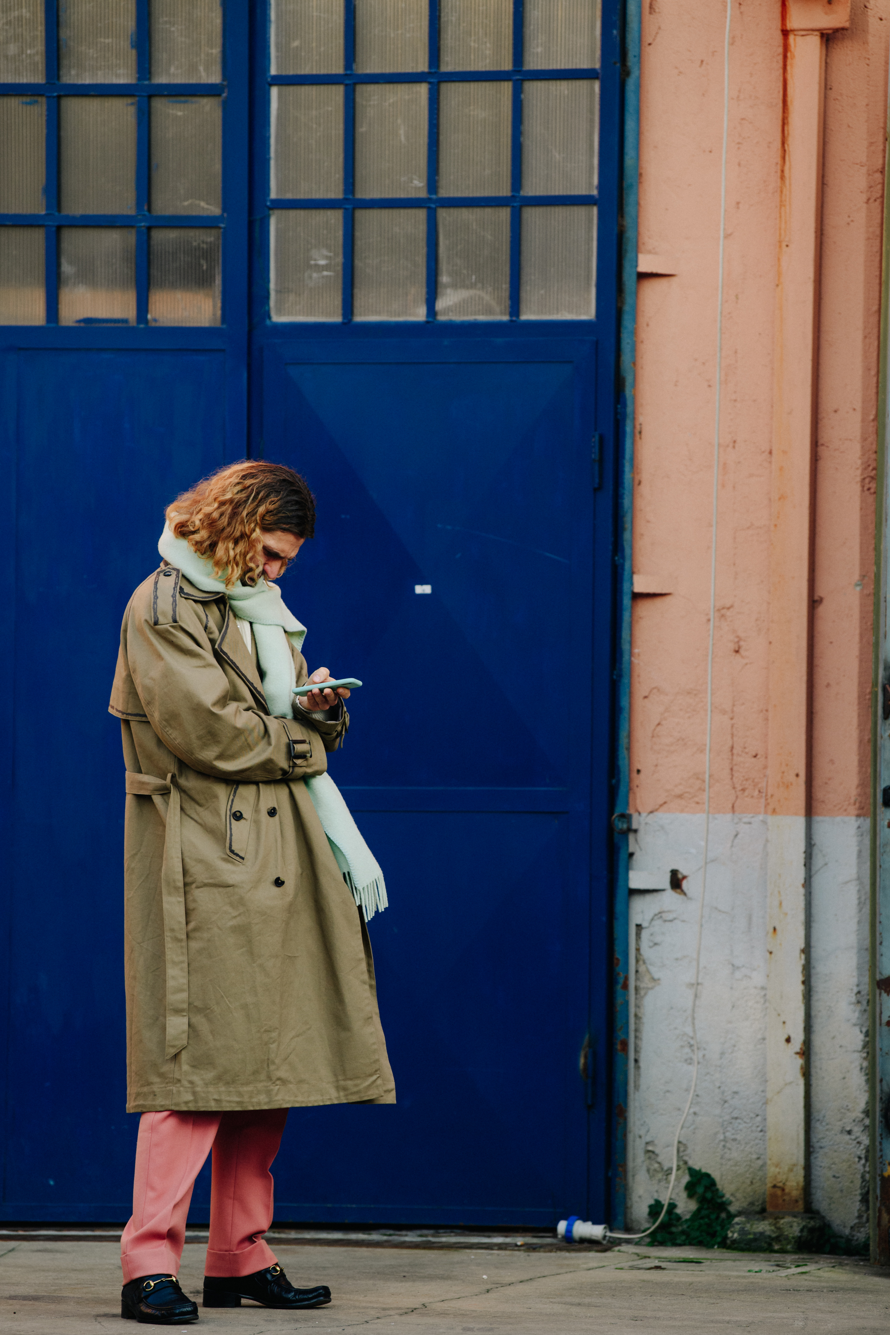 Man wearing tan coat