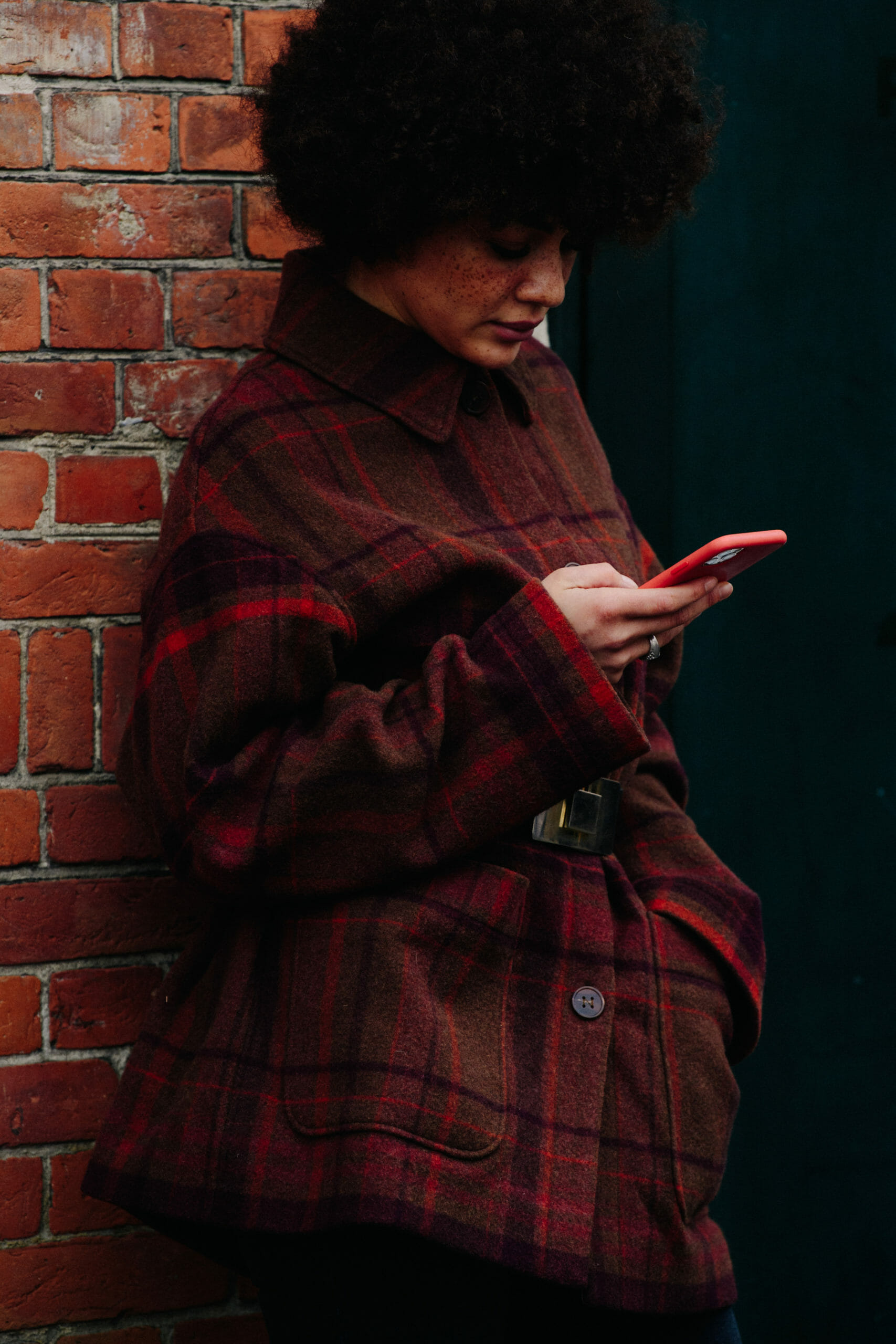 Woman wearing brown check