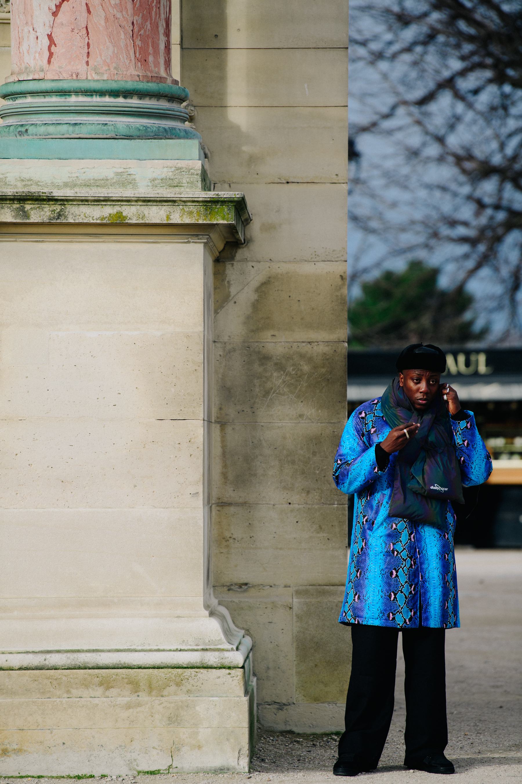 Man wearing blue coat