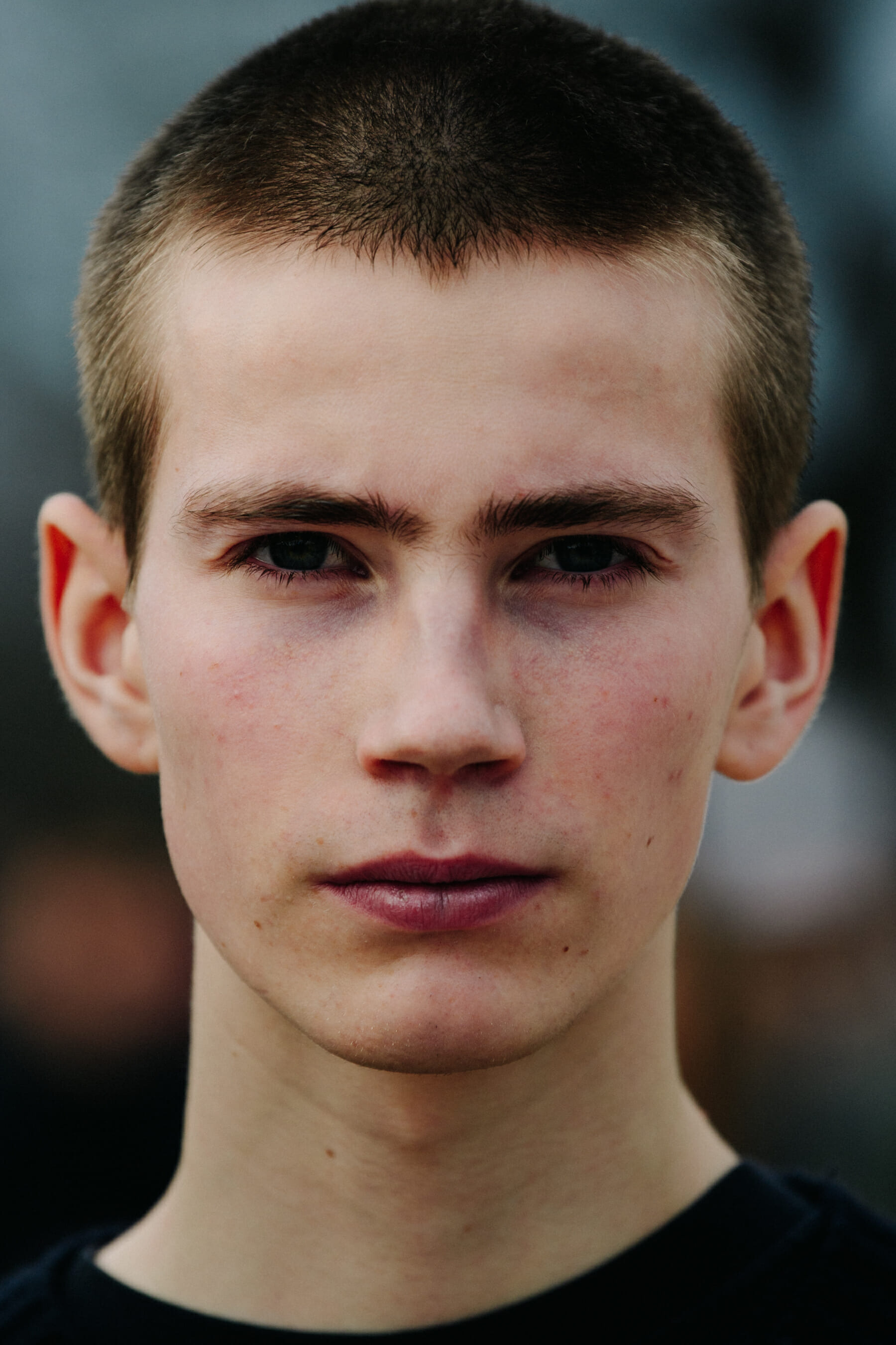 Model with shaved head