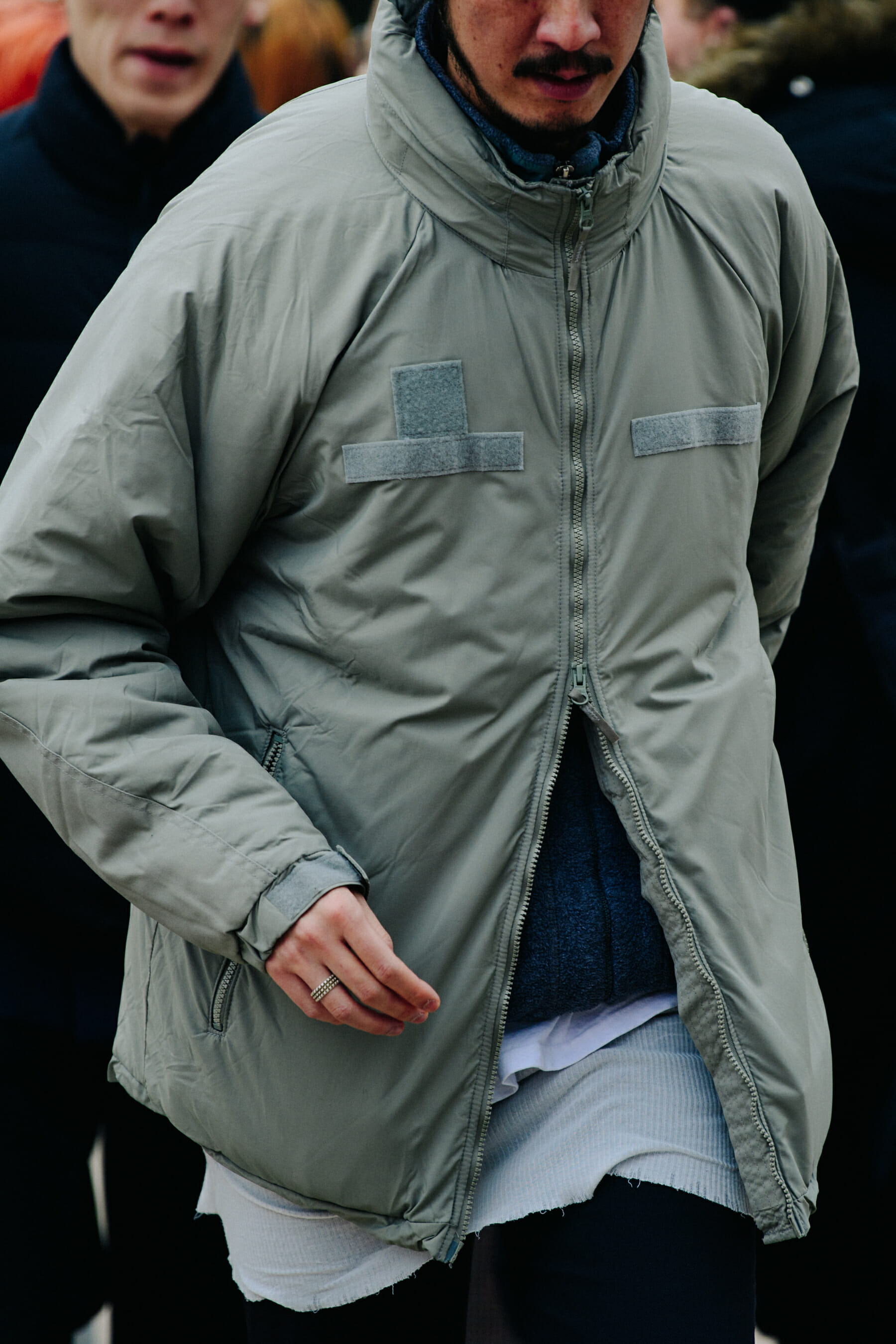 Man wearing dark grey jacket