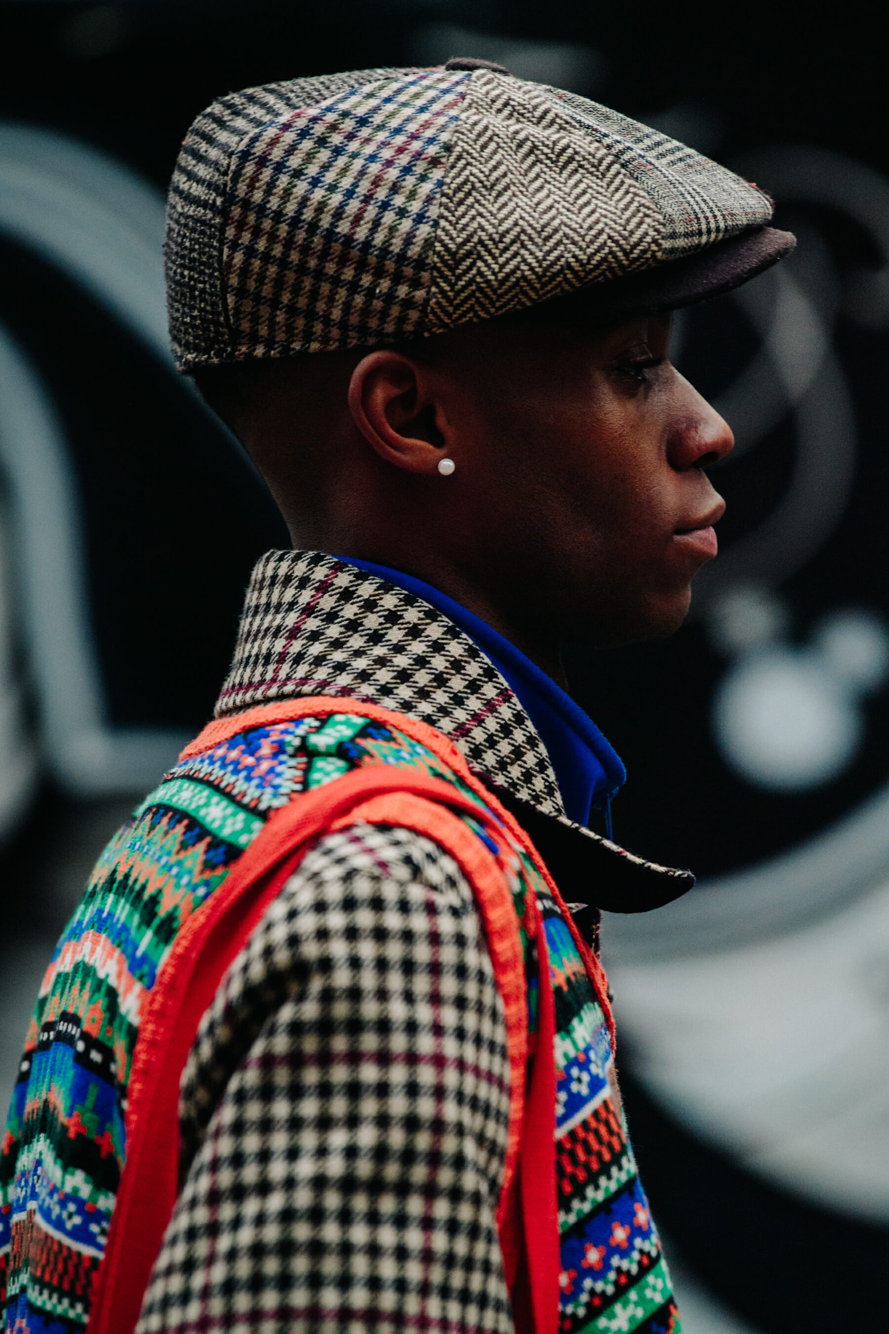 Man wearing colourful vest