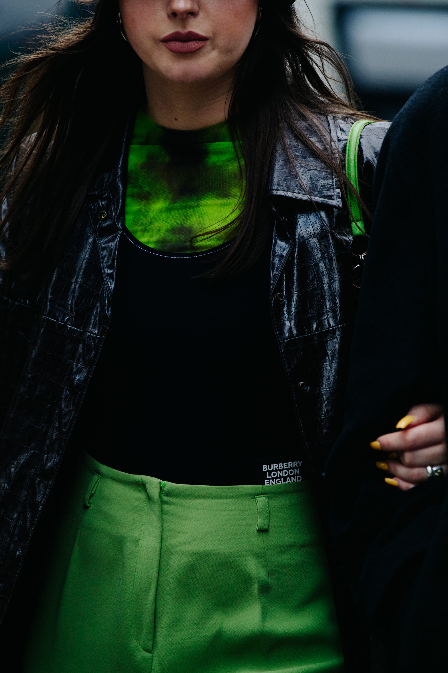 Woman wearing green pants
