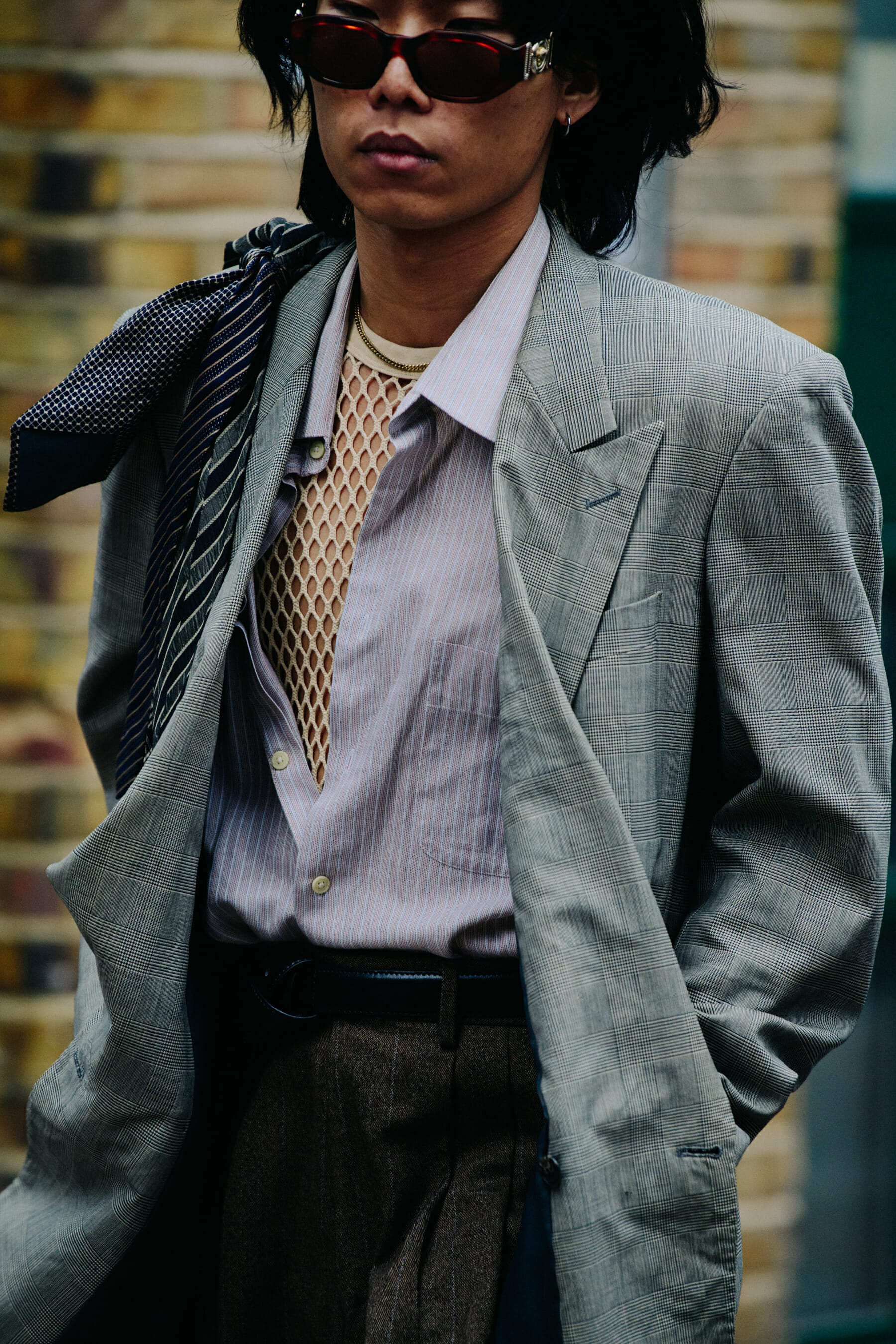 Man wearing grey suit jacket