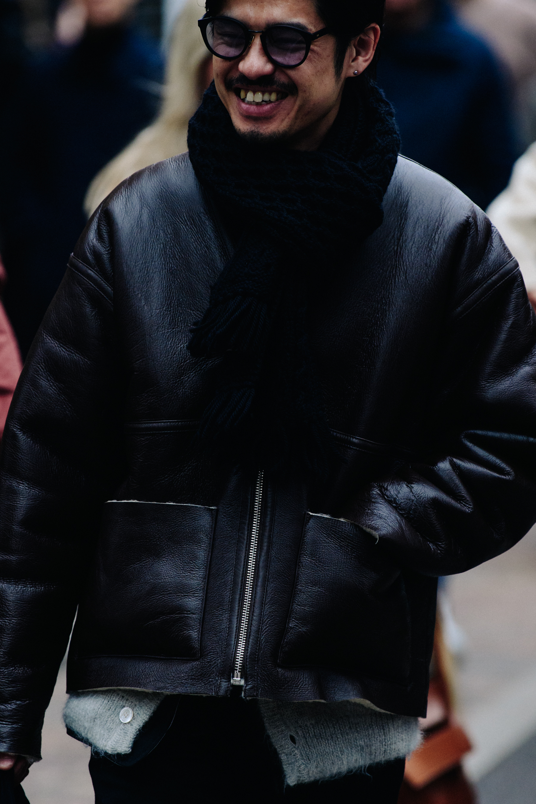 Man wearing dark leather jacket