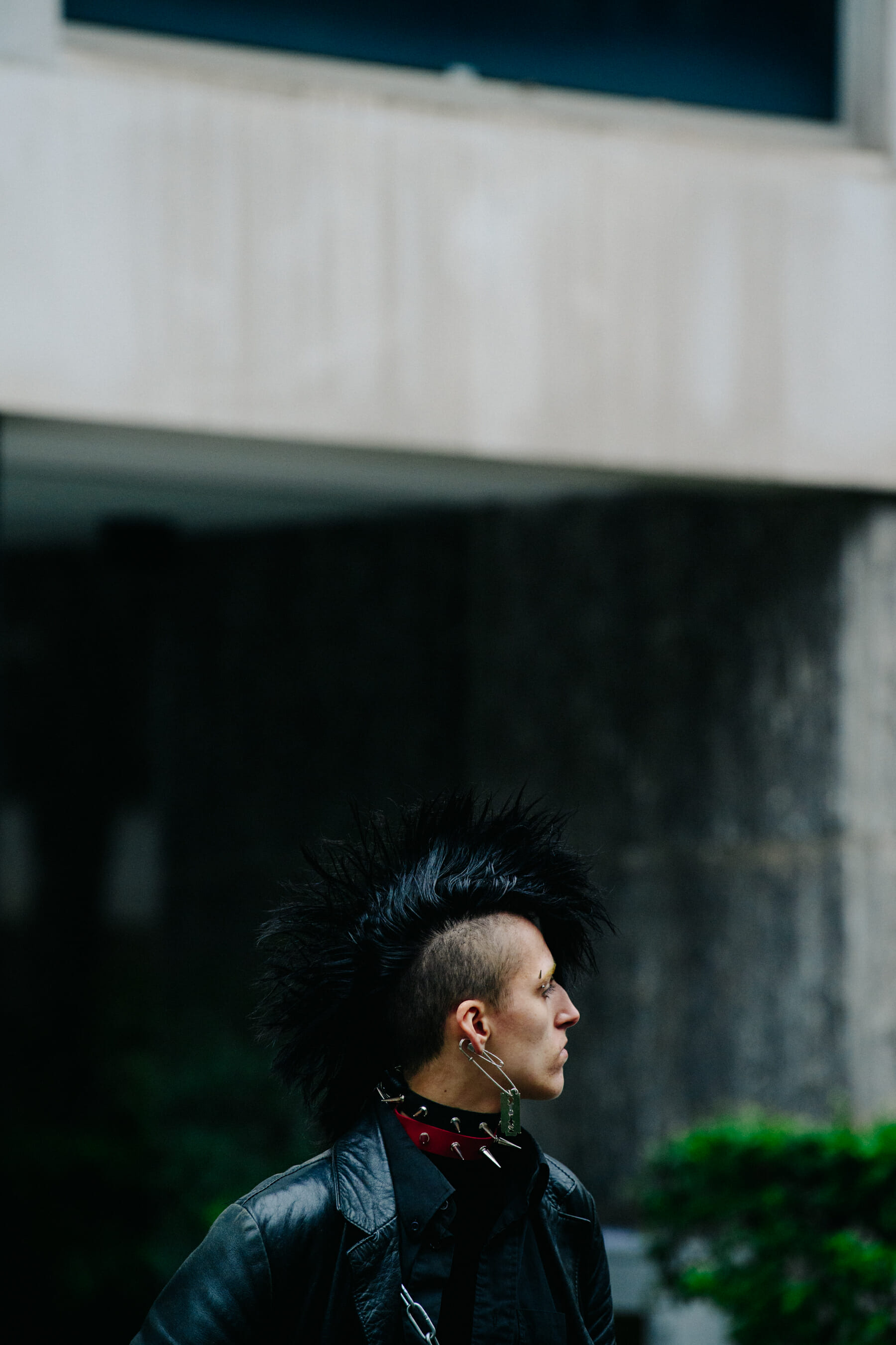 Man wearing spiked choker