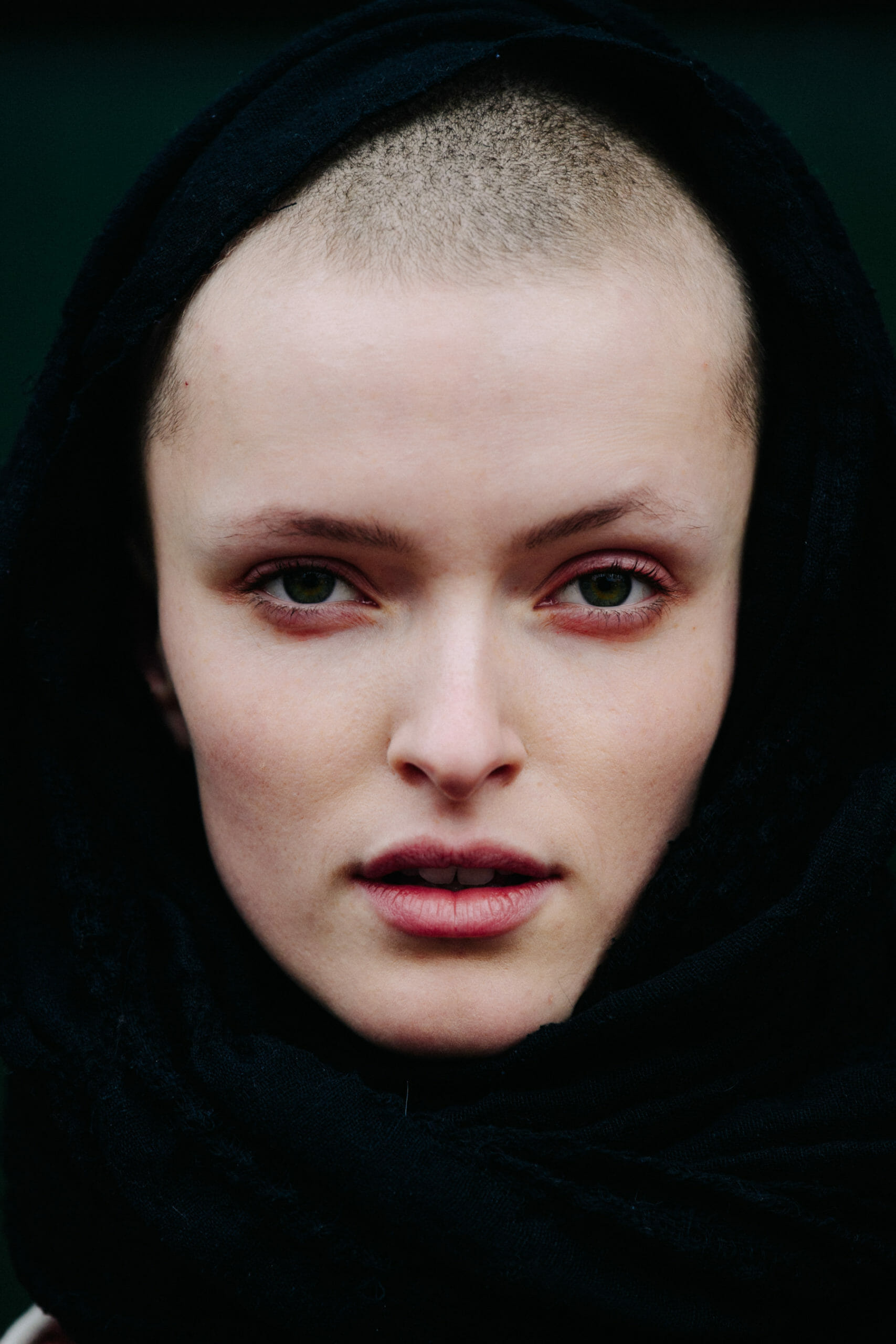Model with shaved head