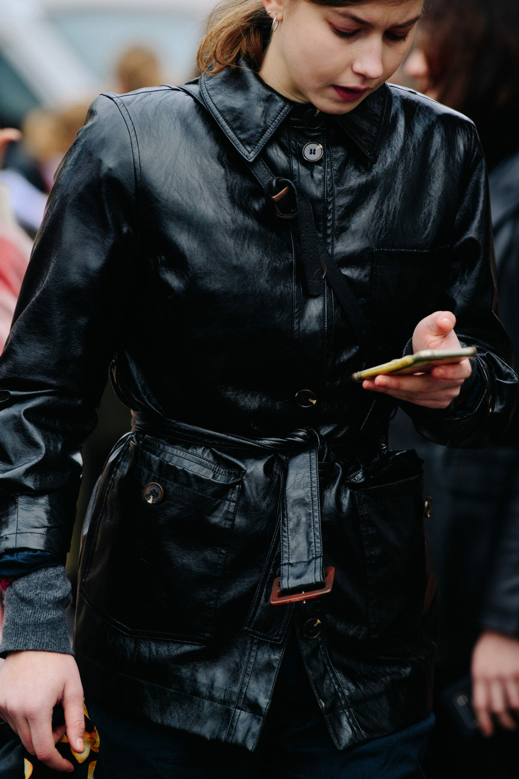 Model wearing black leather