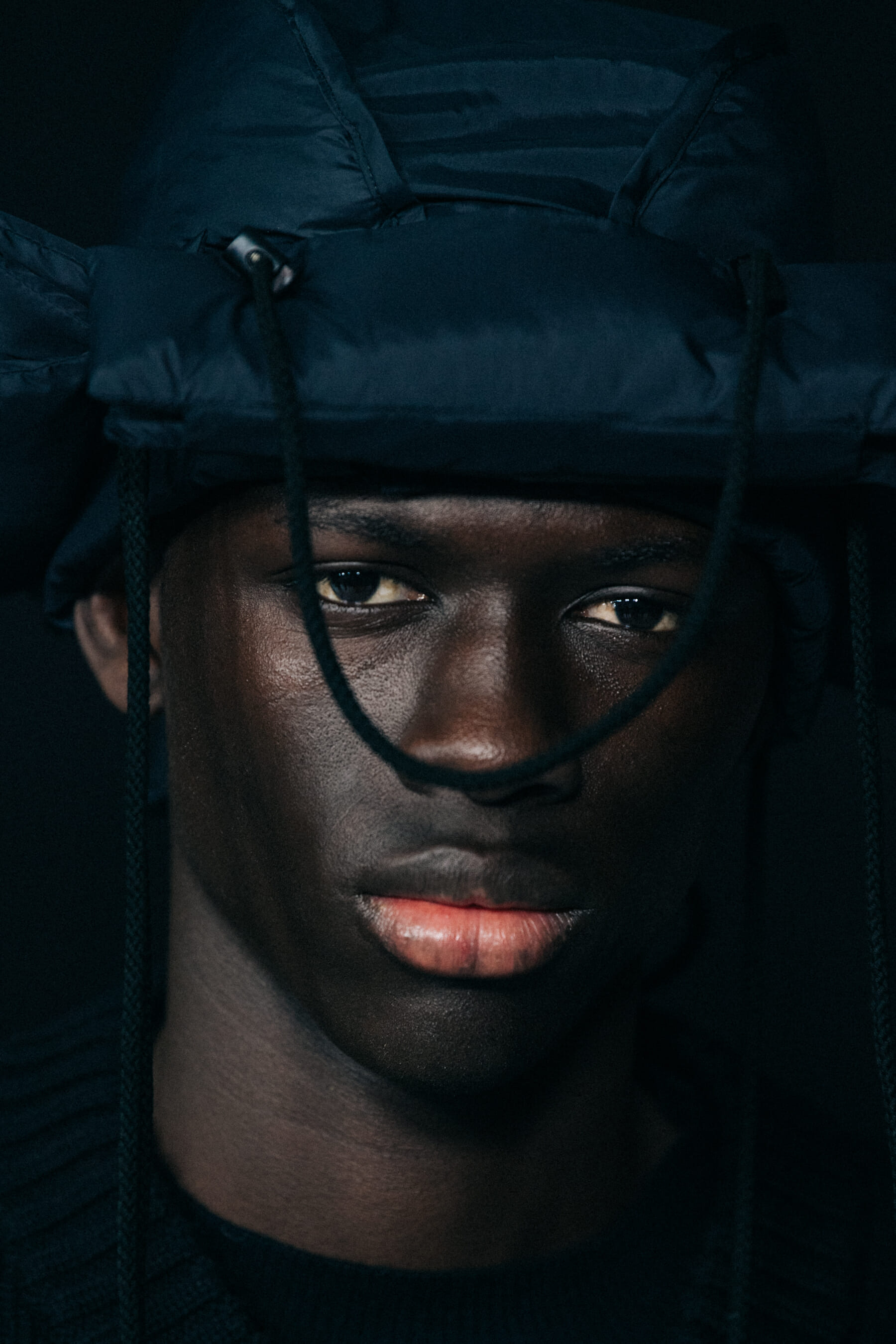 Model wearing black Craig Green outfit