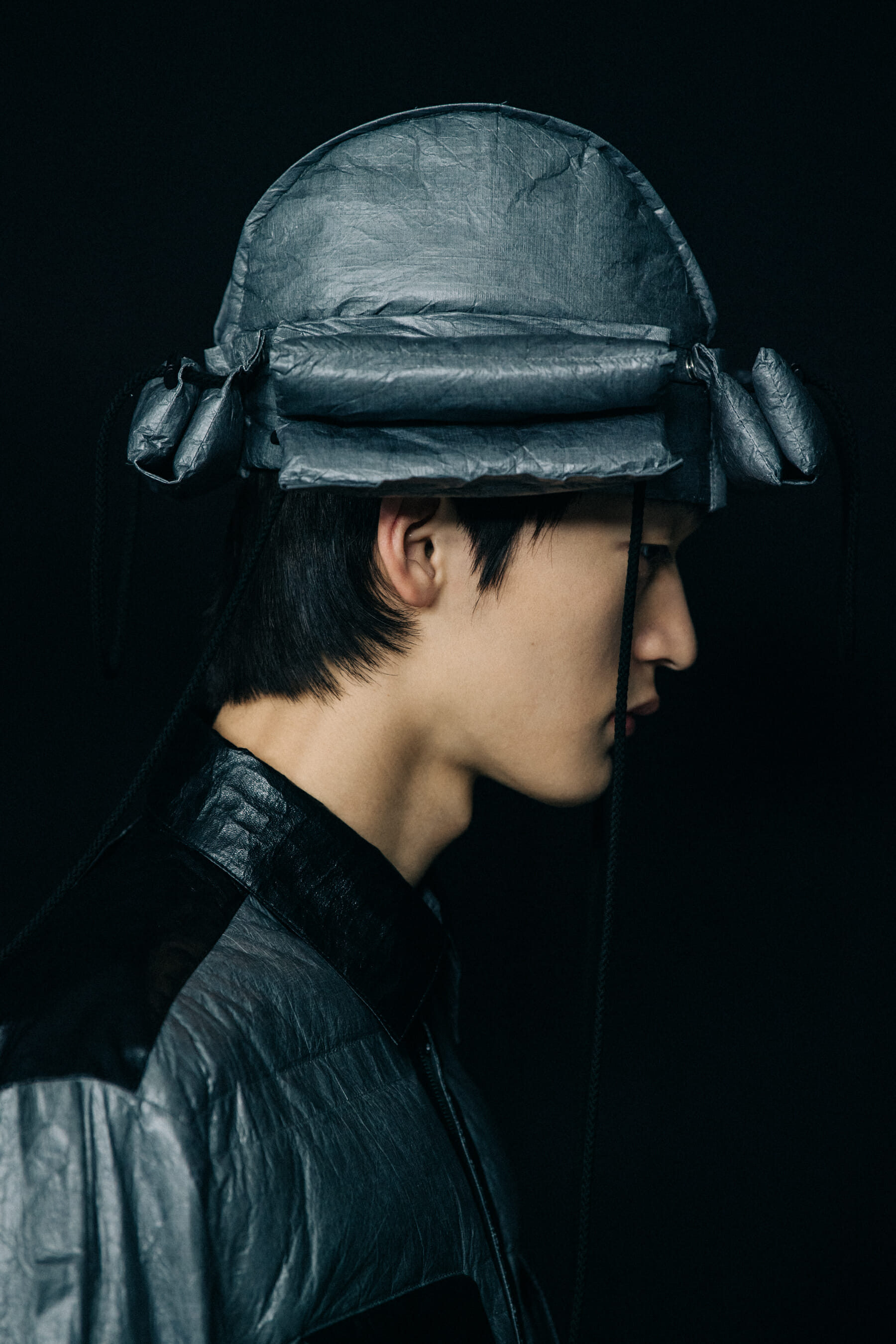 Model wearing silver Craig Green outfit