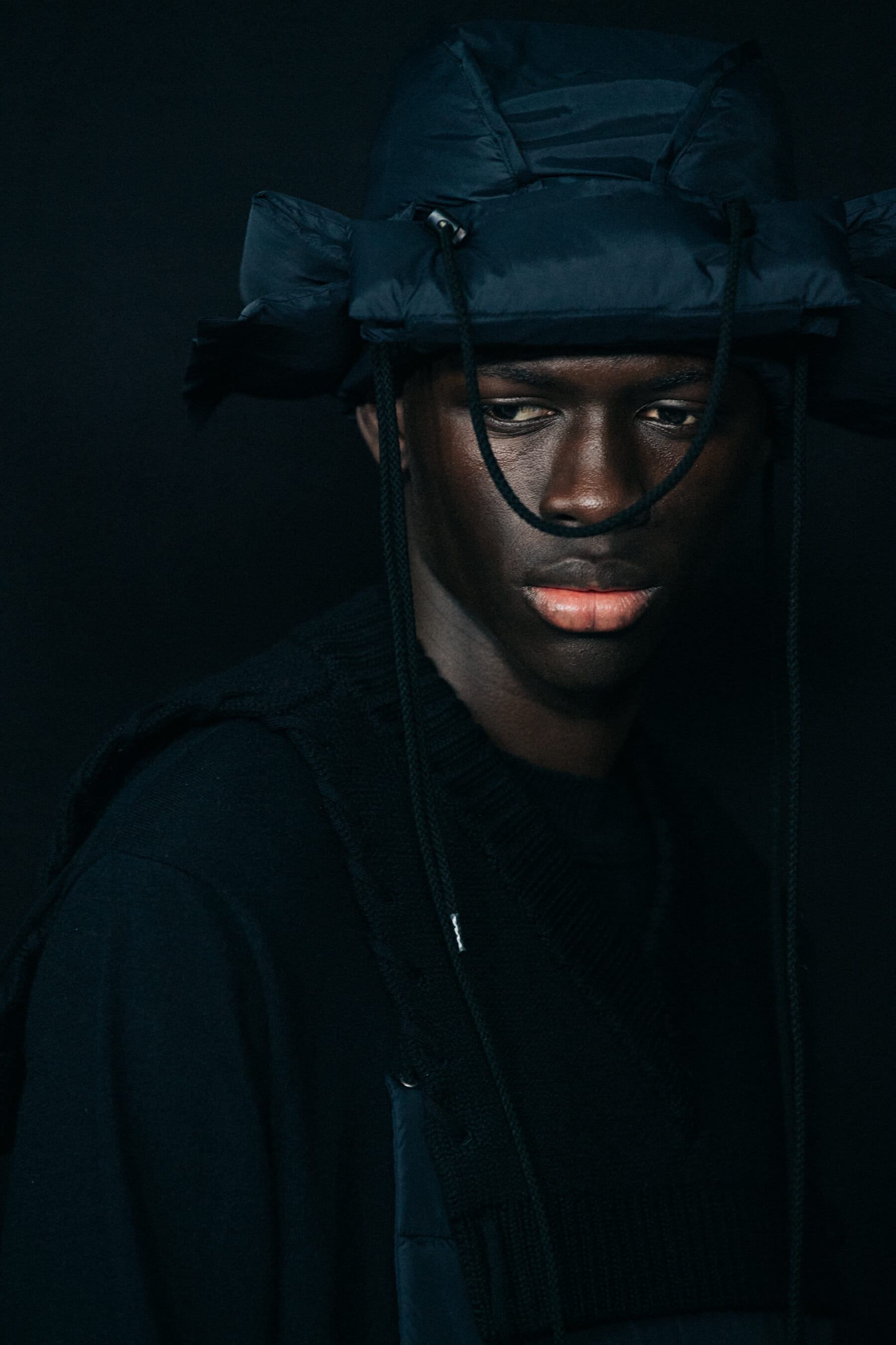 Model wearing black Craig Green outfit