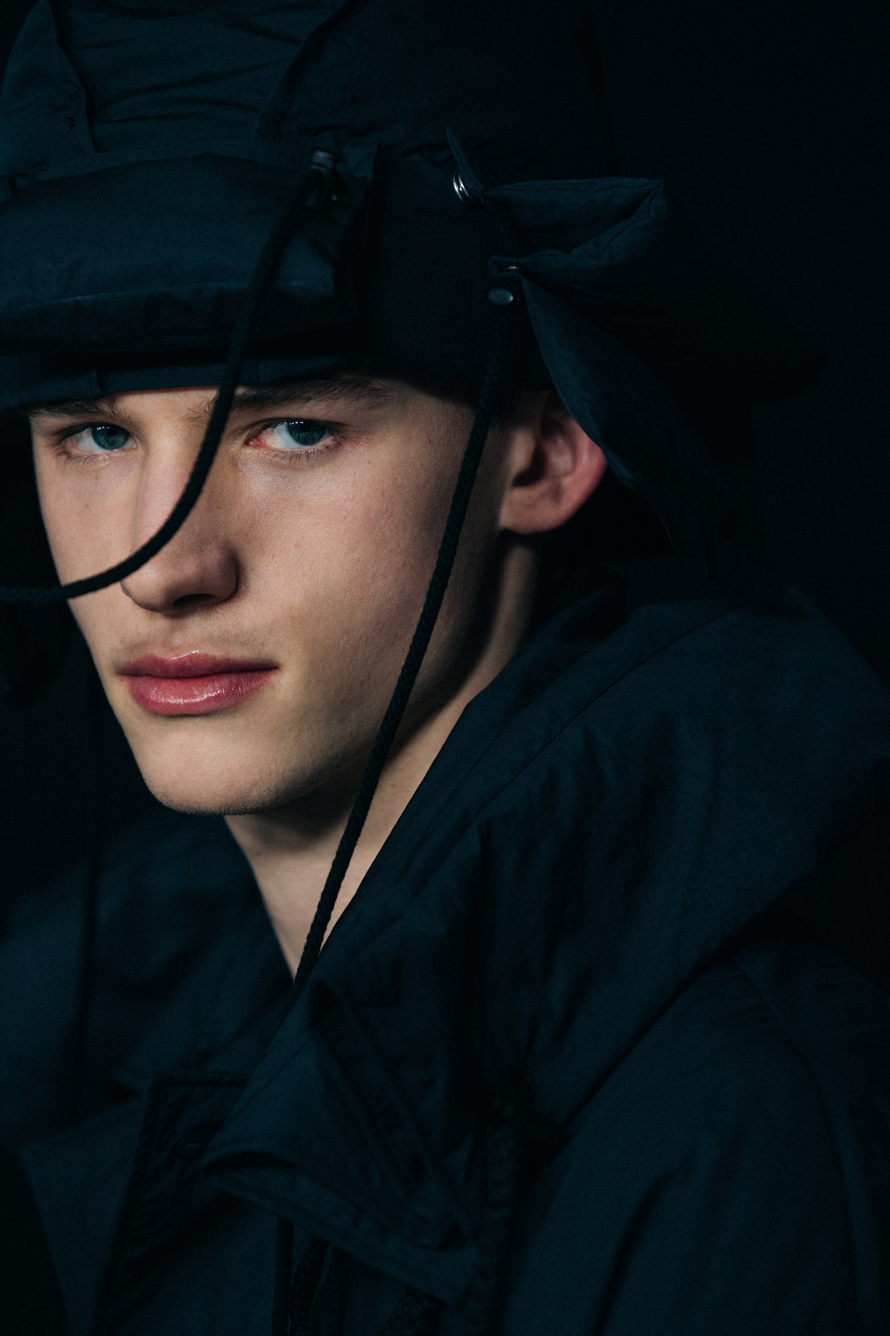 Model wearing black Craig Green outfit