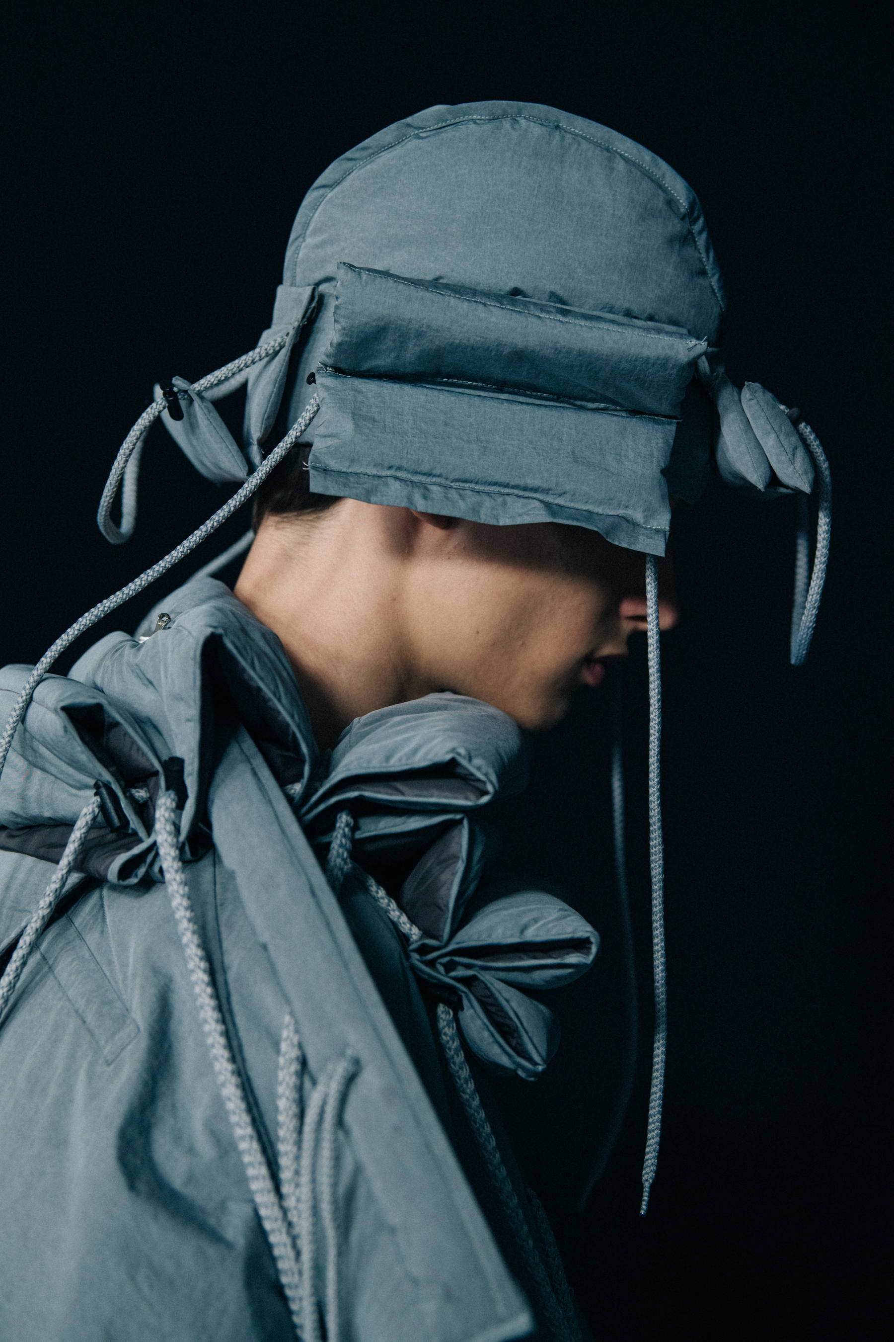 Model wearing silver Craig Green outfit
