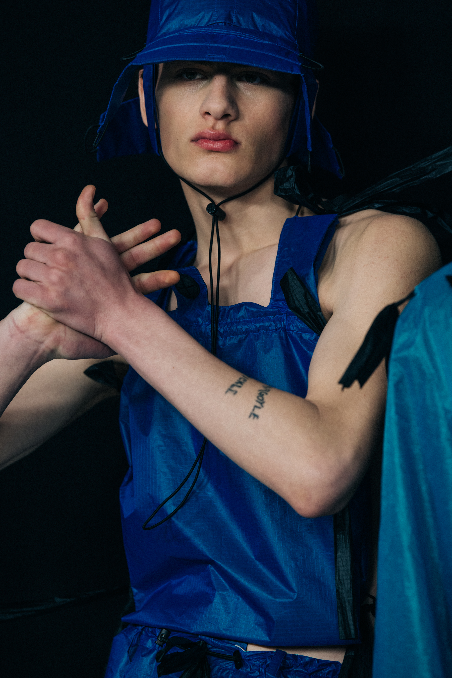 Model wearing blue Craig Green outfit