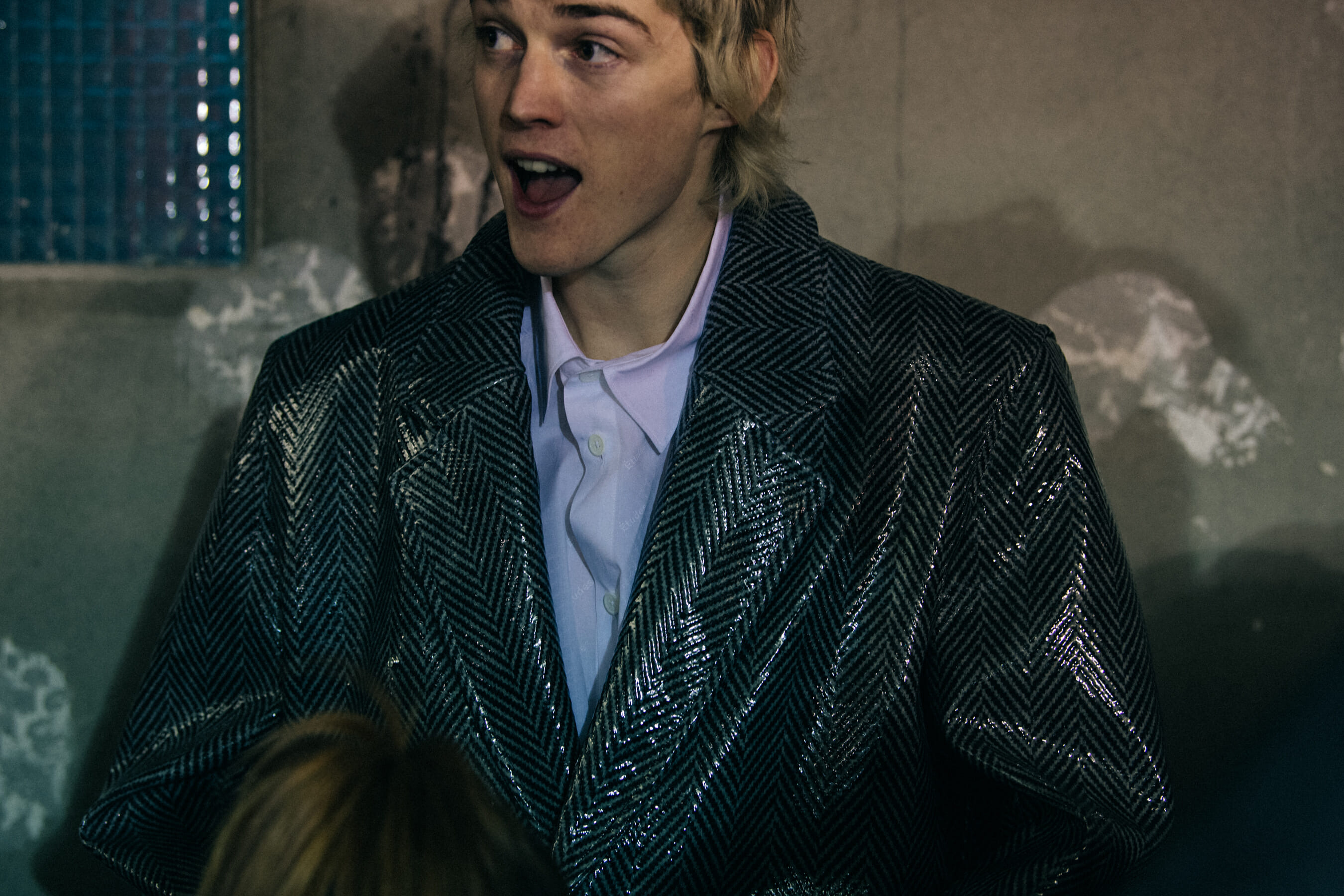 Models wearing grey outfits
