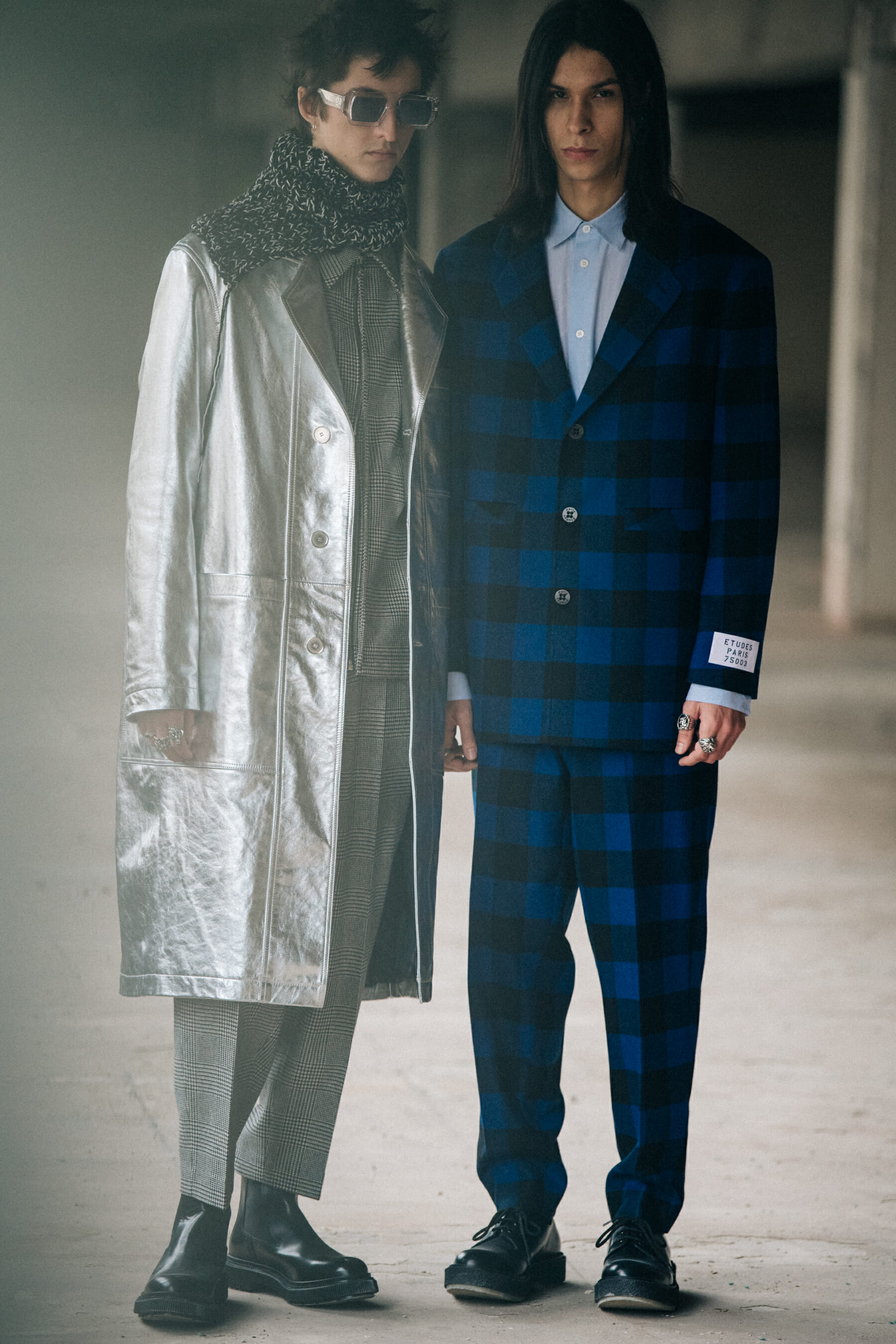 Models wearing grey outfits