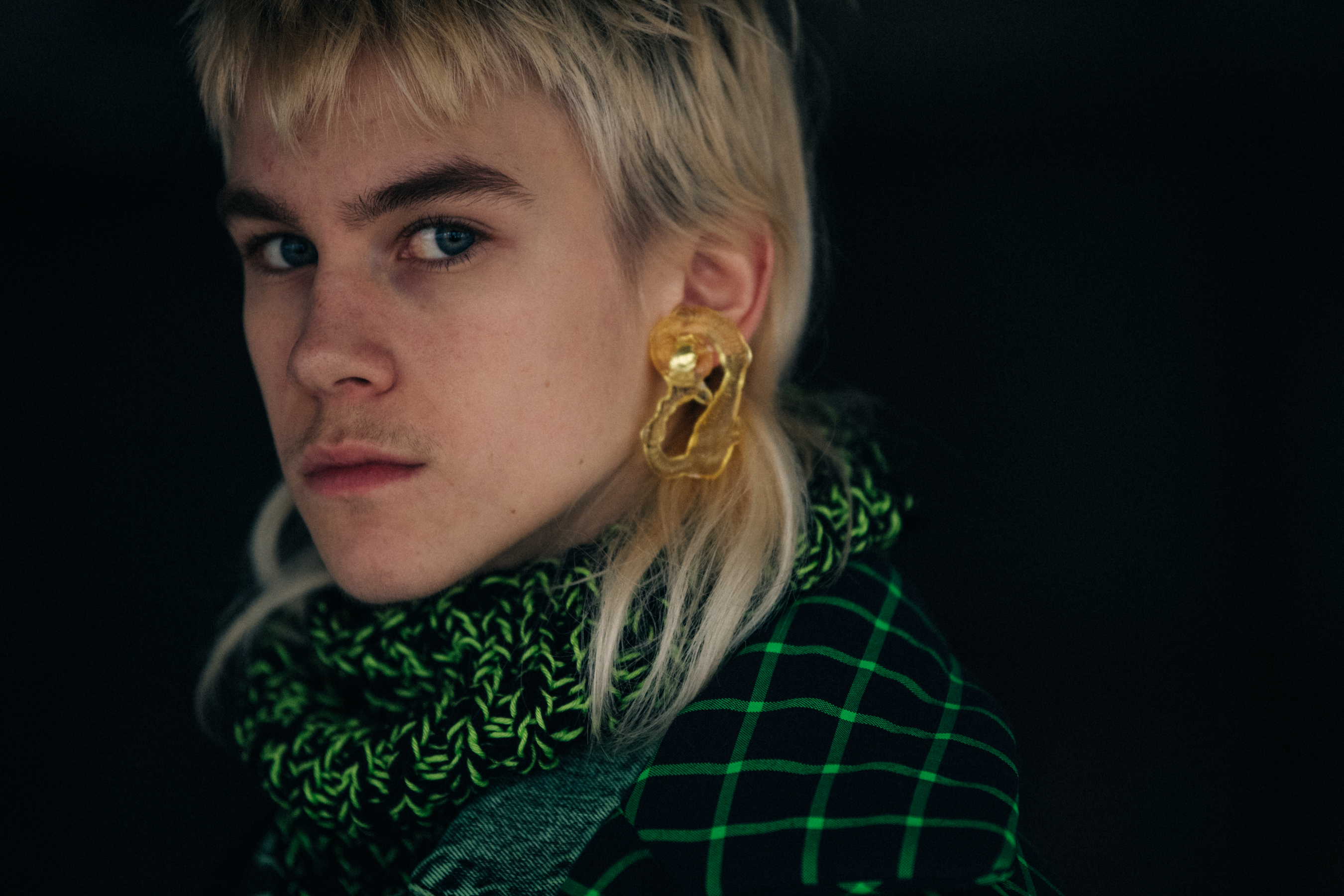 Model wearing green at Etudes