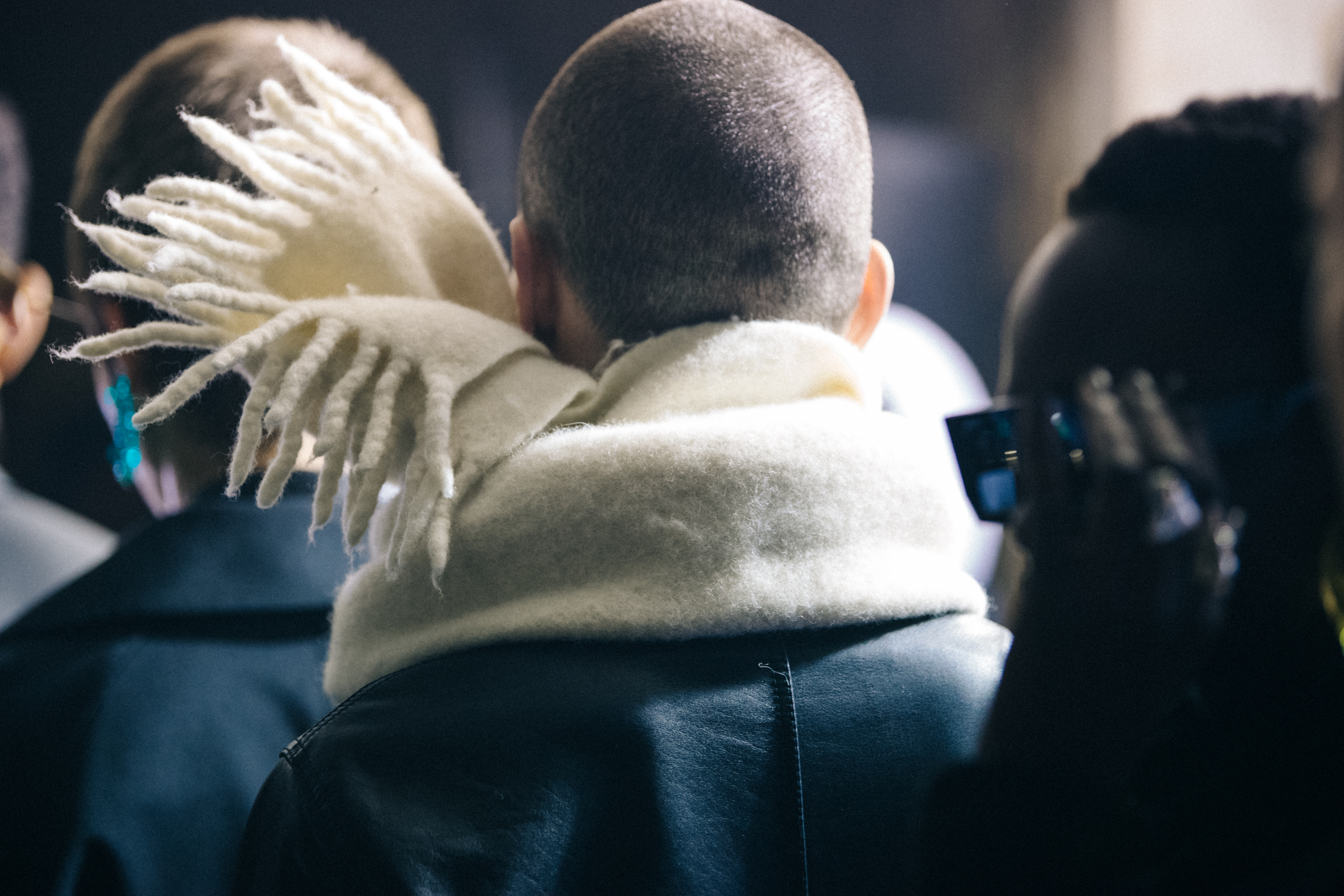 Models wearing grey outfits