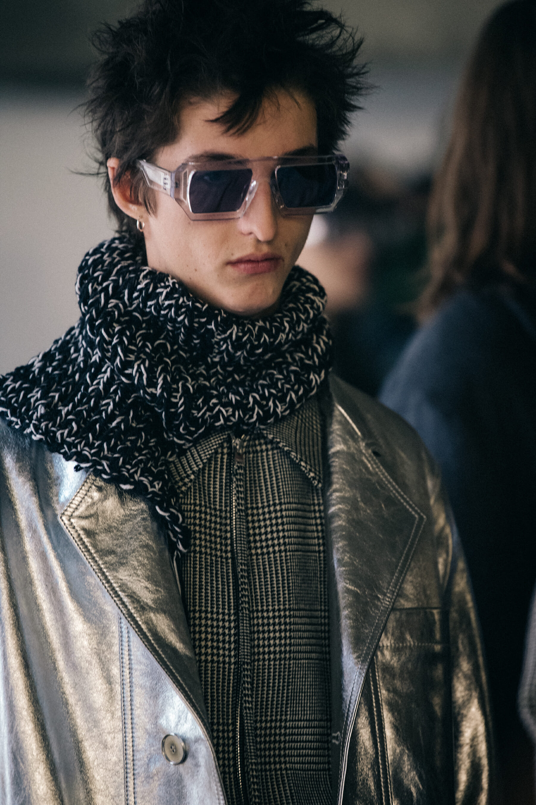 Models wearing grey outfits