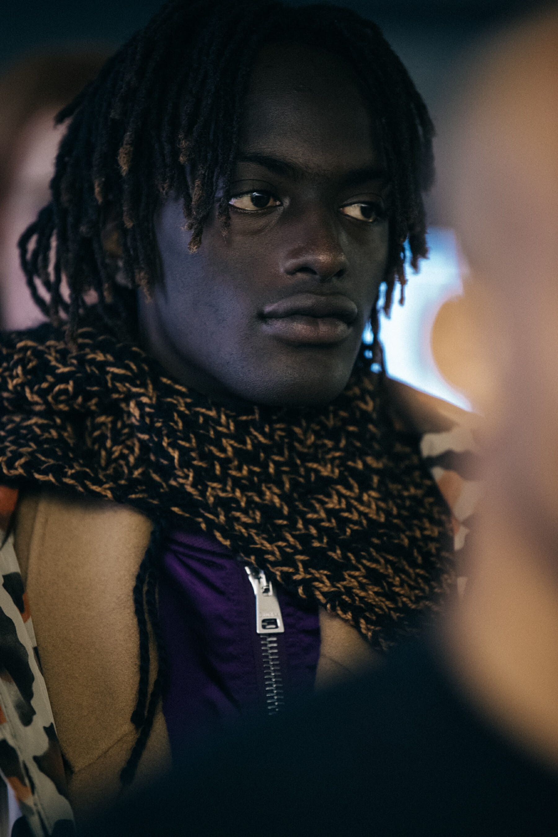 Models wearing dark outfits