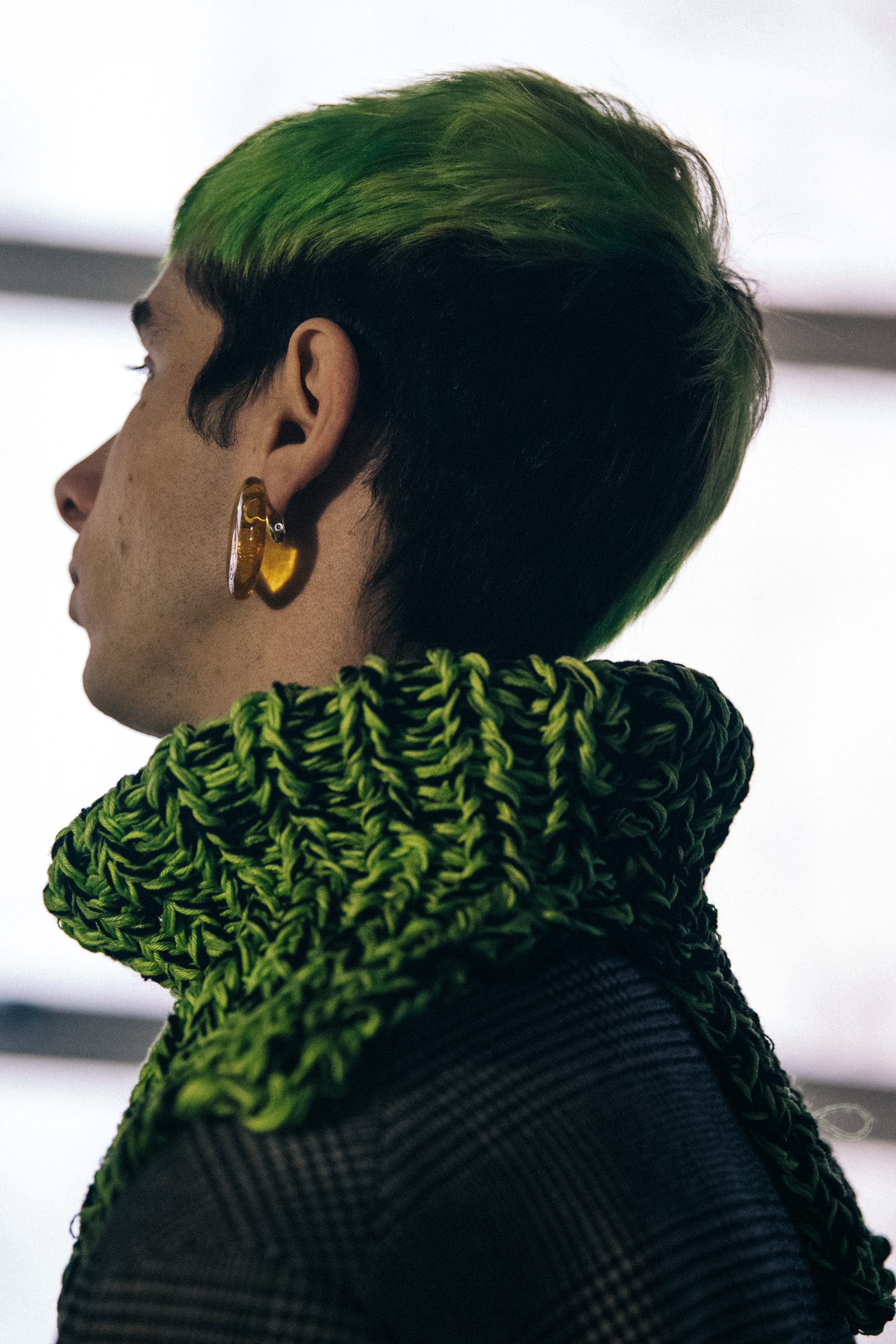 Model wearing green at Etudes