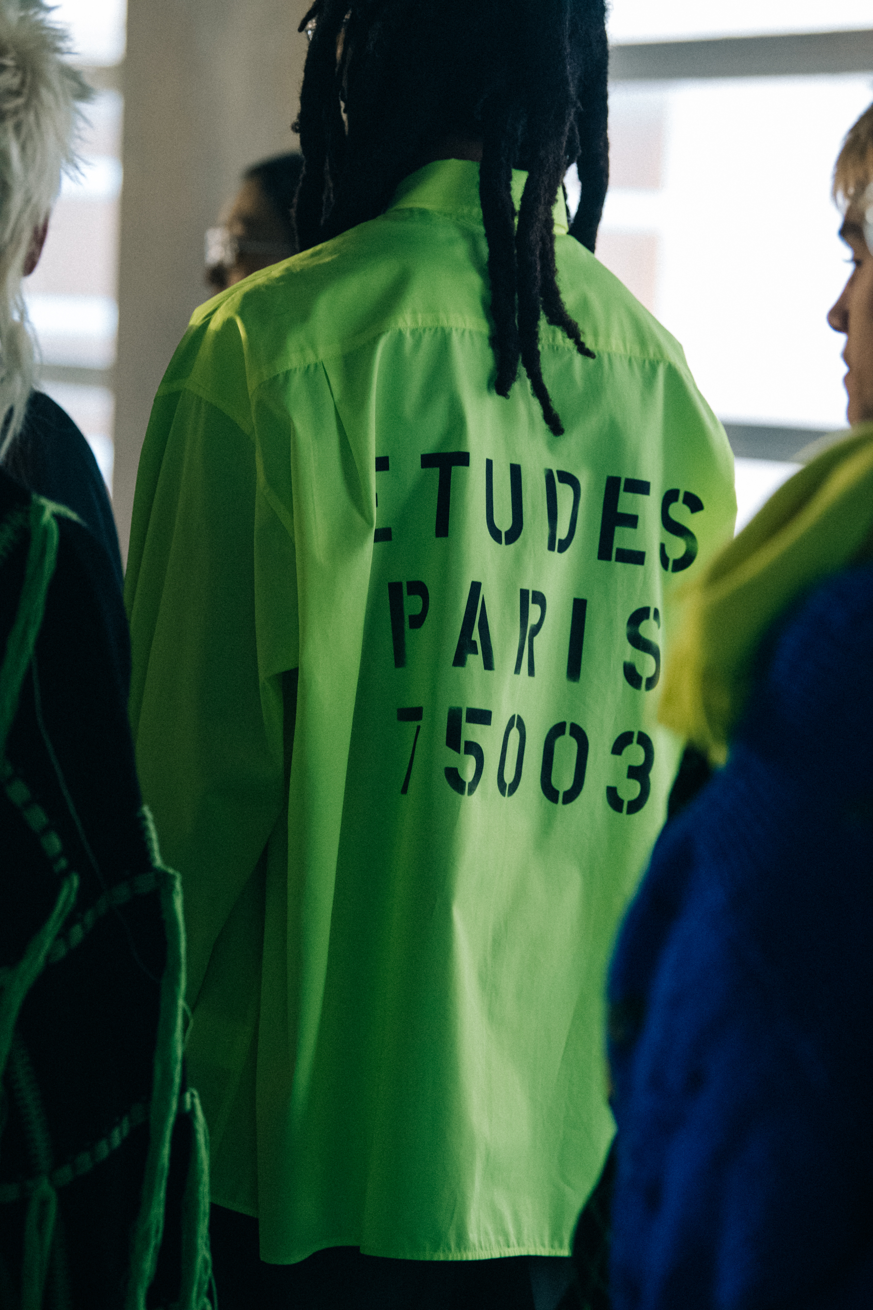 Model wearing green at Etudes