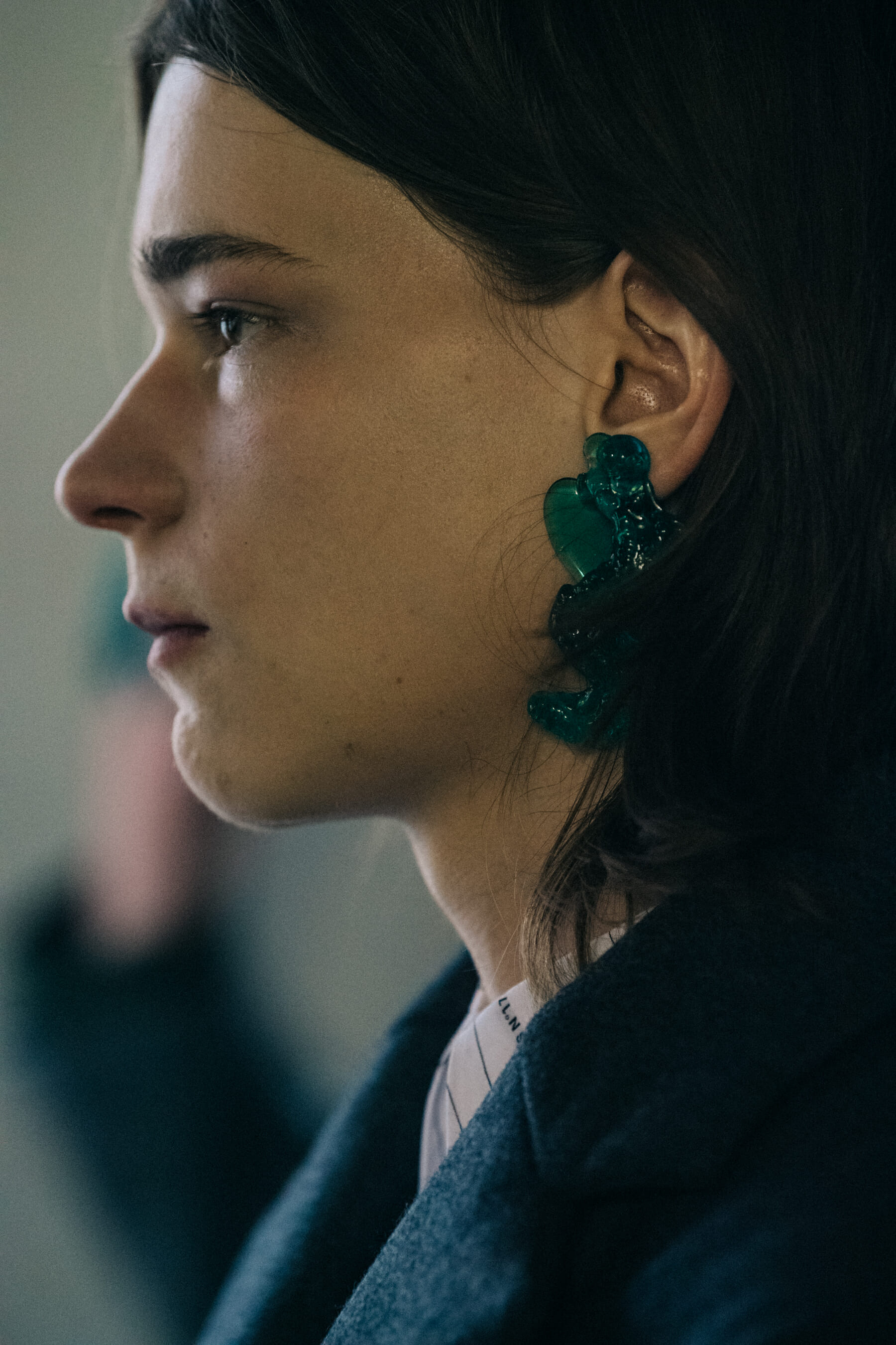 Model wearing Etudes earring