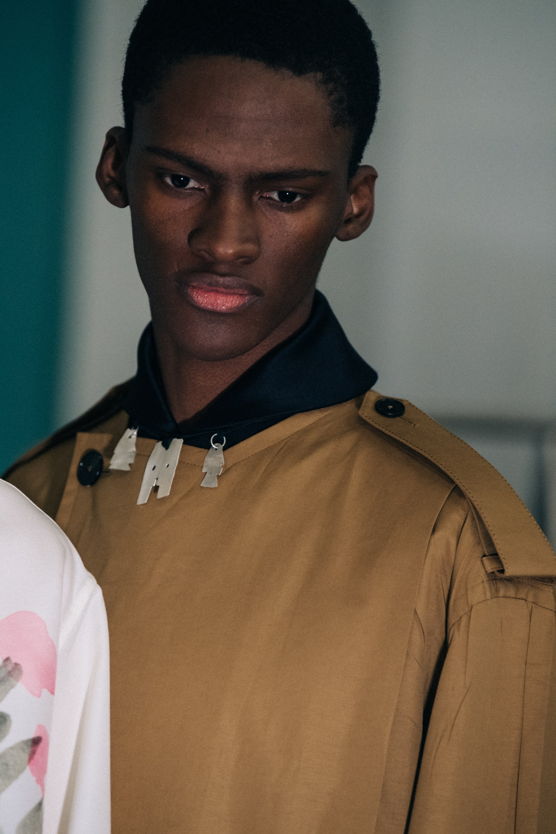 Model wearing tan Jil Sander outfits