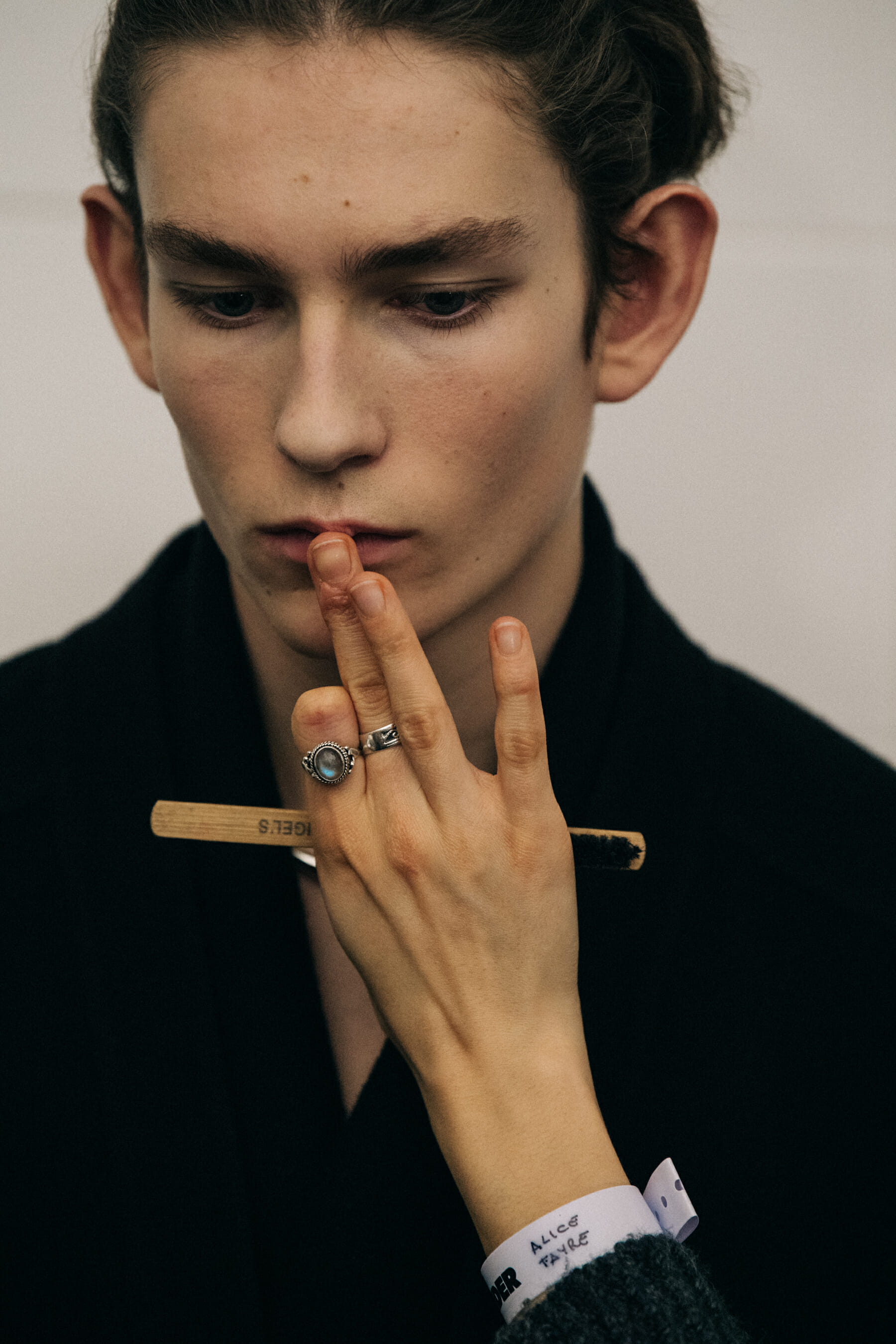 Models wearing dark Jil Sander outfits