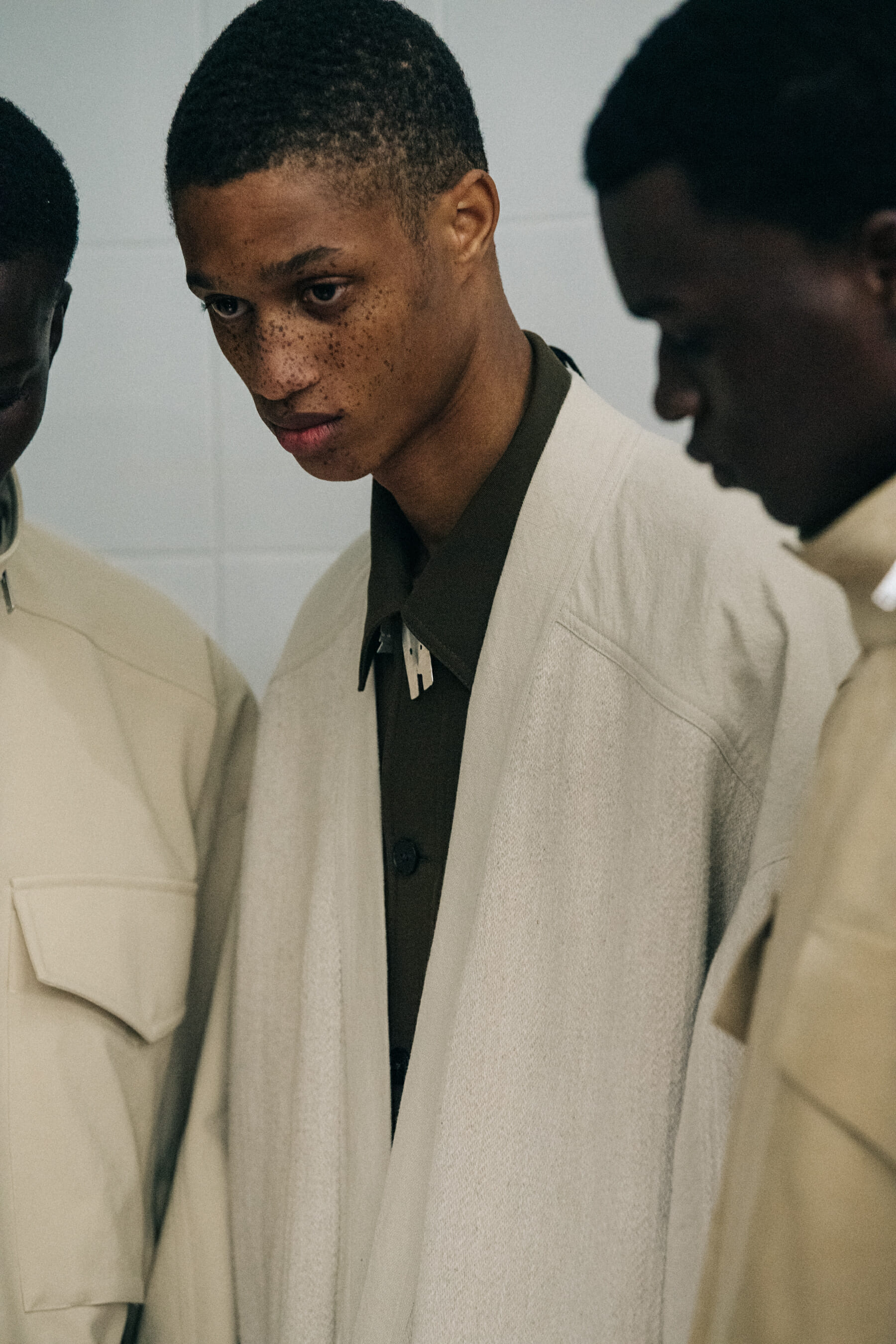 Models wearing light Jil Sander outfits