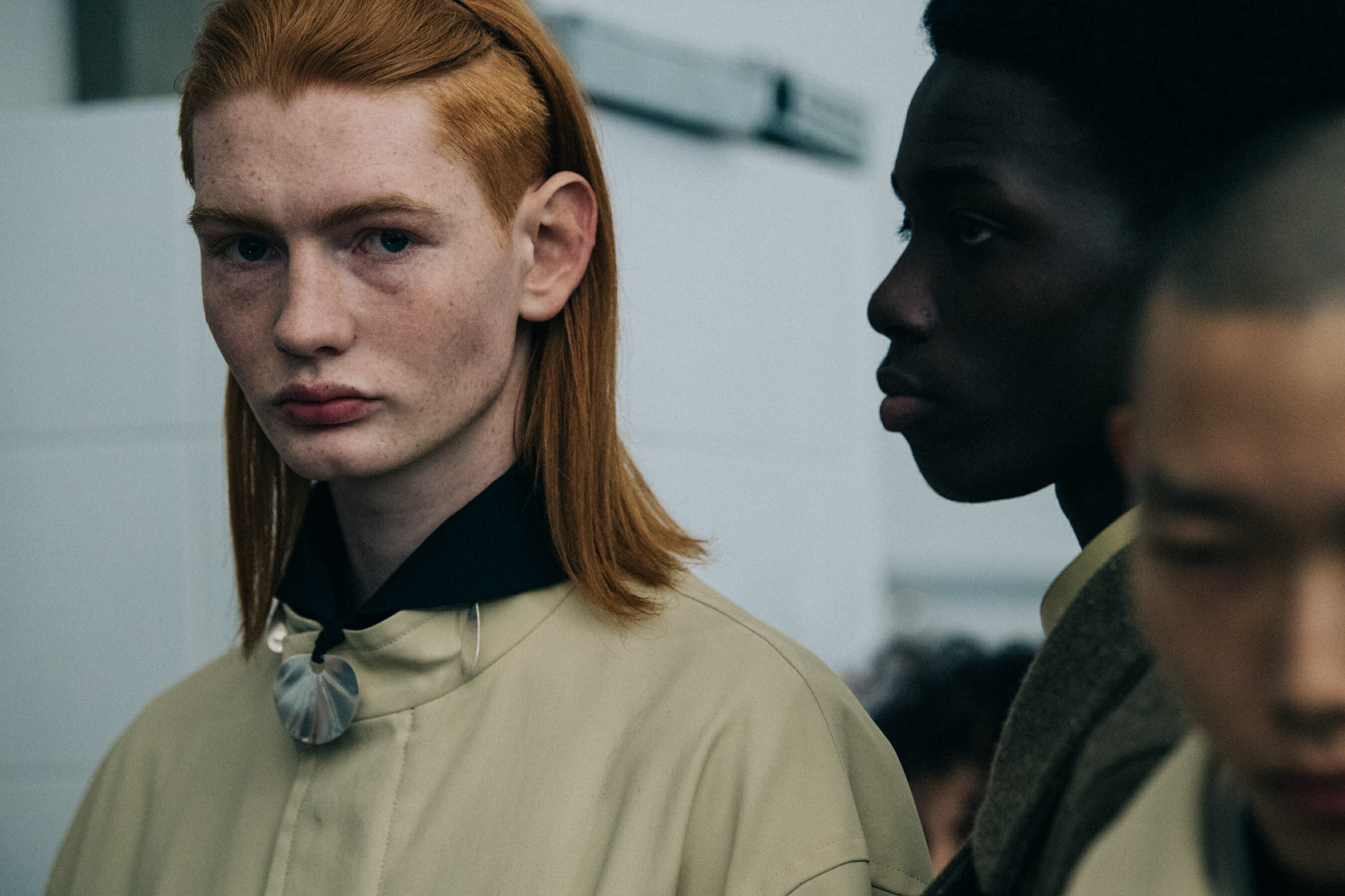 Models wearing light Jil Sander outfits