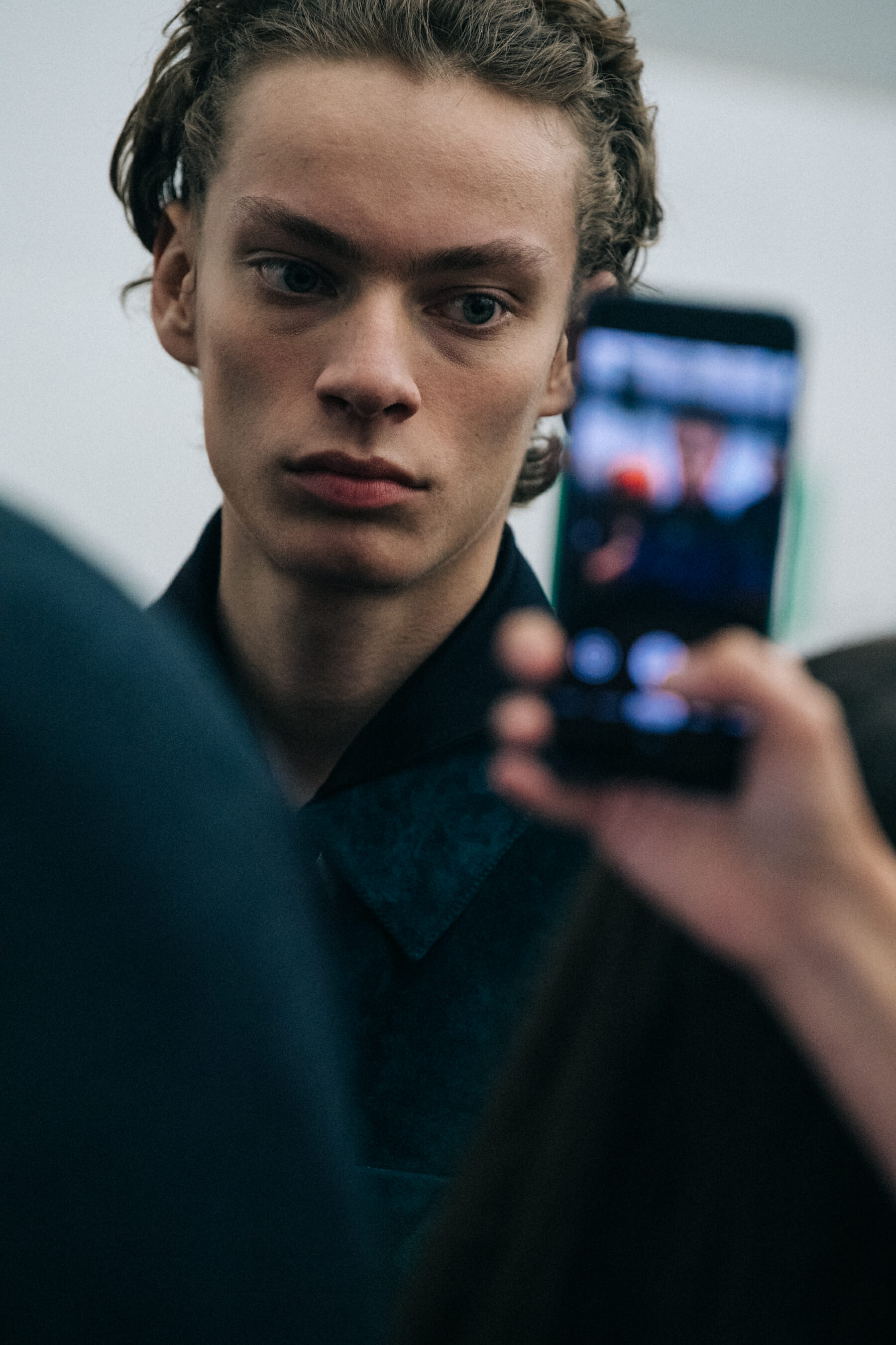Models wearing dark Jil Sander outfits