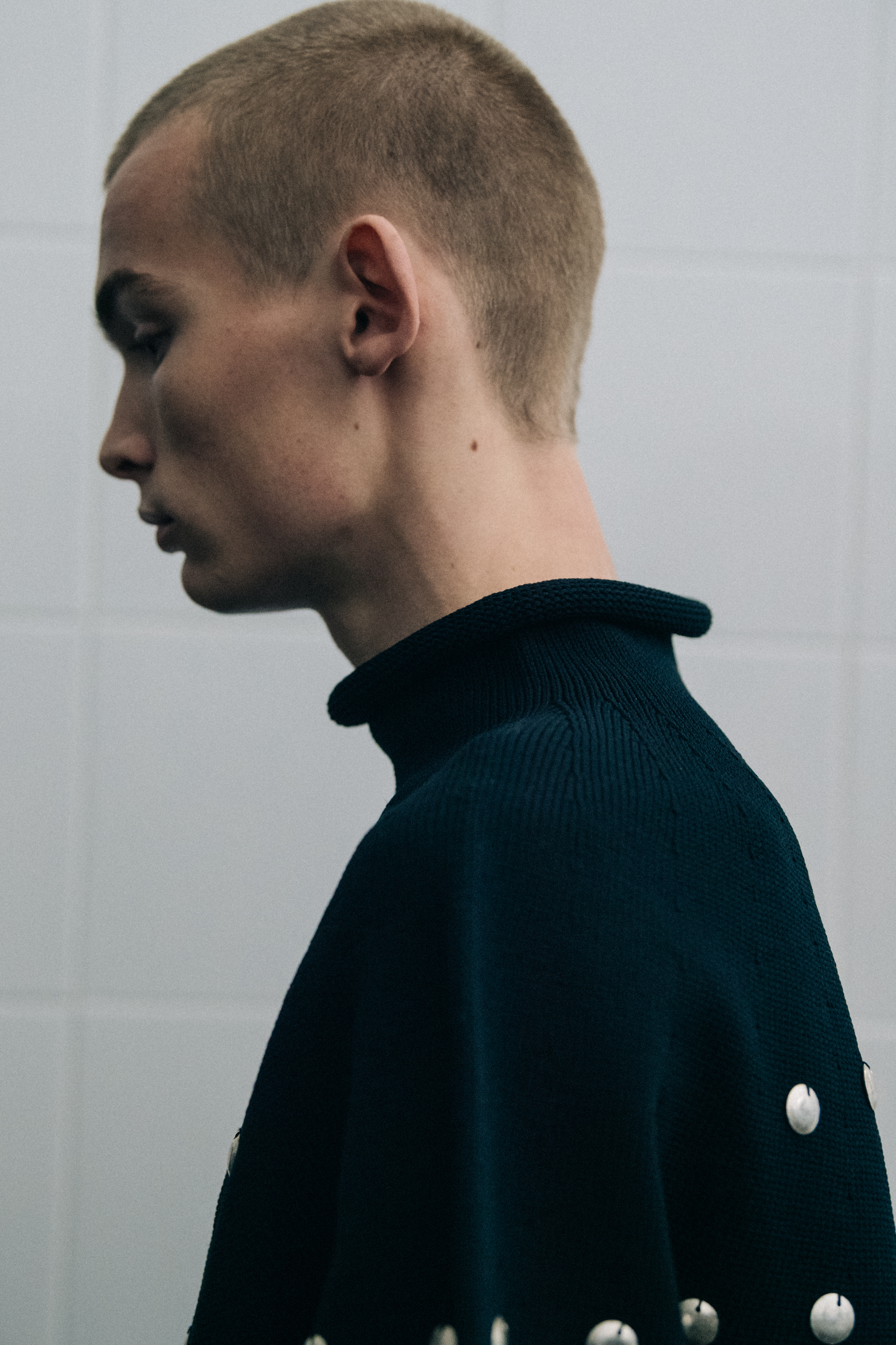 Models wearing dark Jil Sander outfits