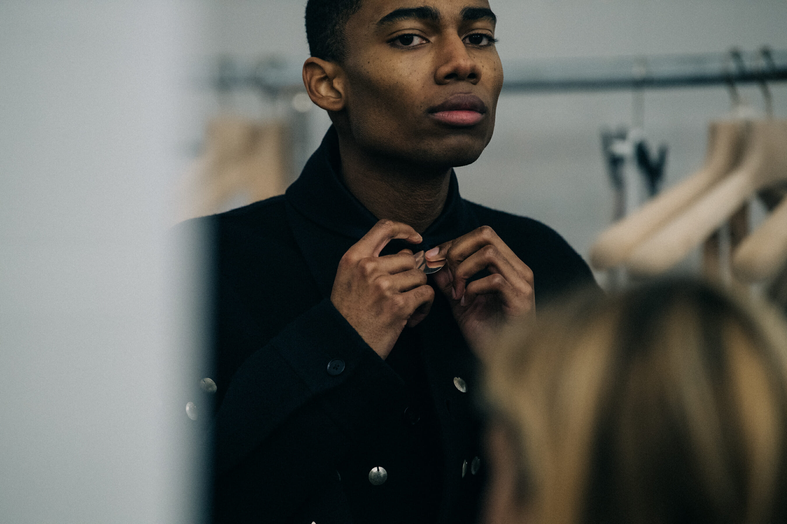 Models wearing dark Jil Sander outfits