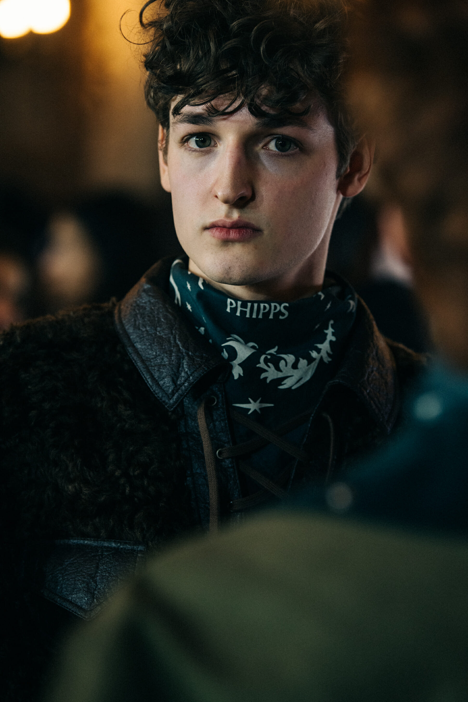 Model wearing dark Phipps outfit