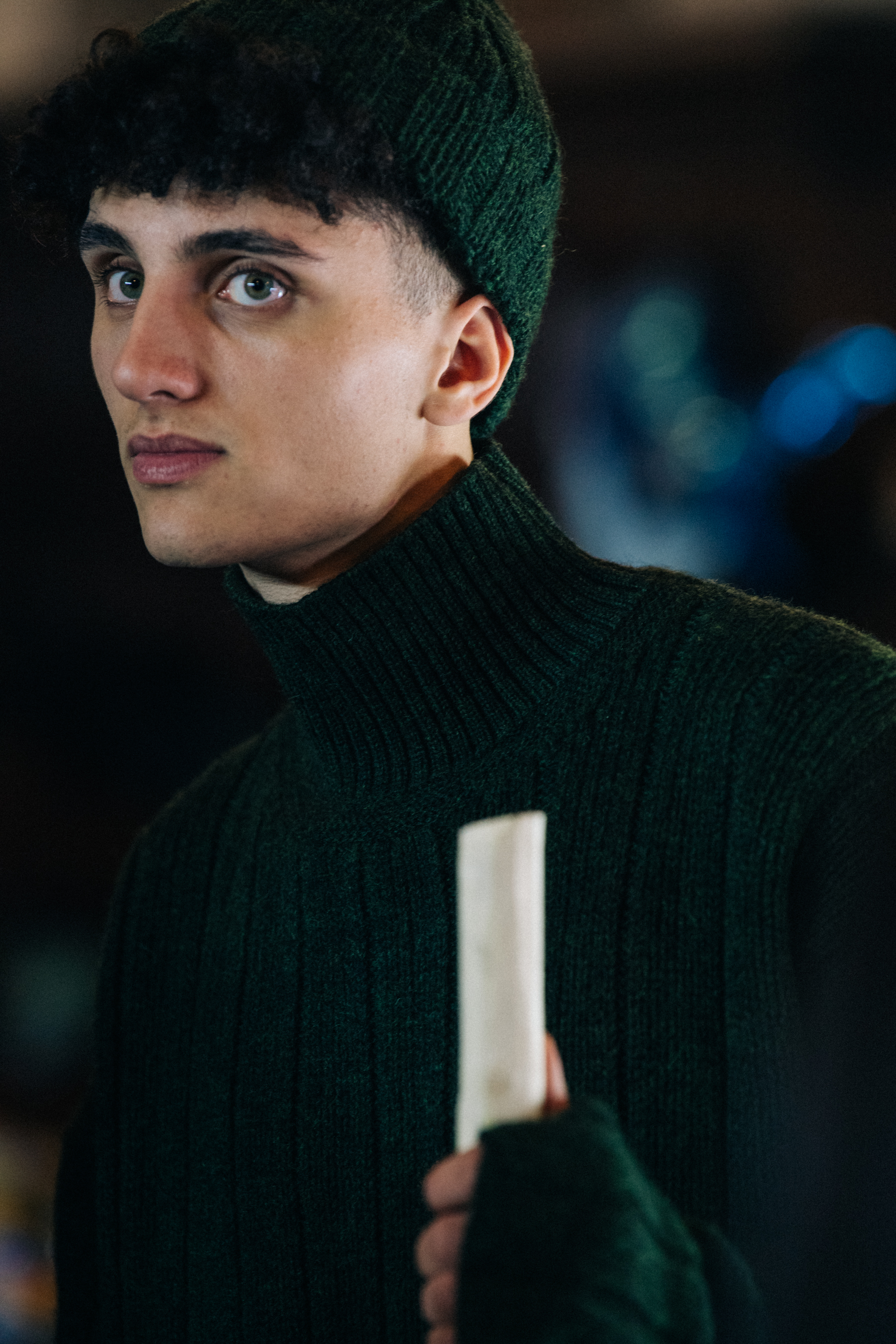 Model wearing dark Phipps outfit